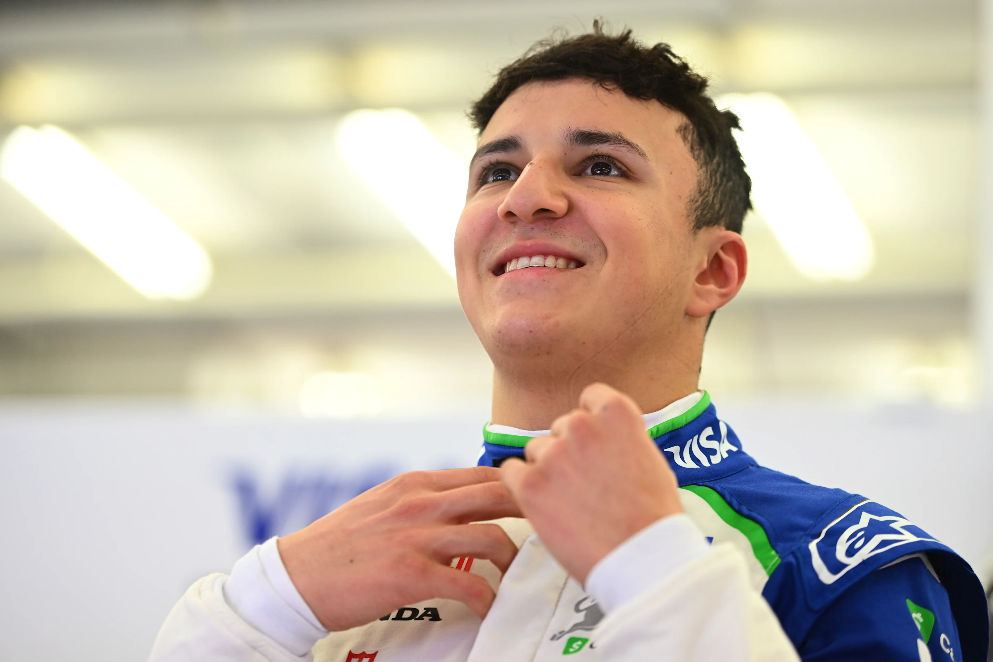 BAHRAIN, BAHRAIN - FEBRUARY 28: Isack Hadjar of France and Visa Cash App Racing Bulls prepares to