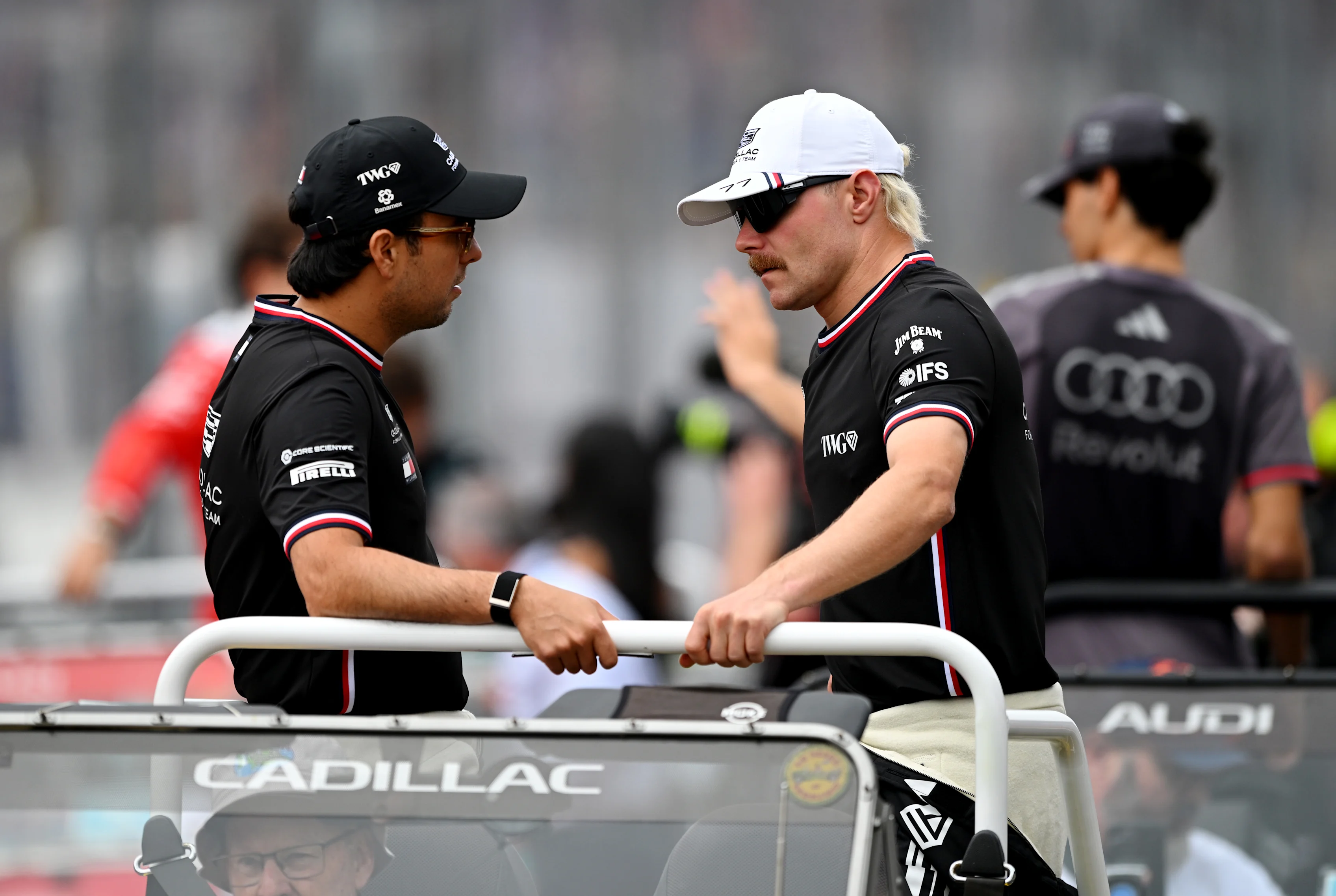 MELBOURNE, AUSTRALIA - MARCH 08: Sergio Perez of Mexico and Cadillac F1 Team and Valtteri Bottas of
