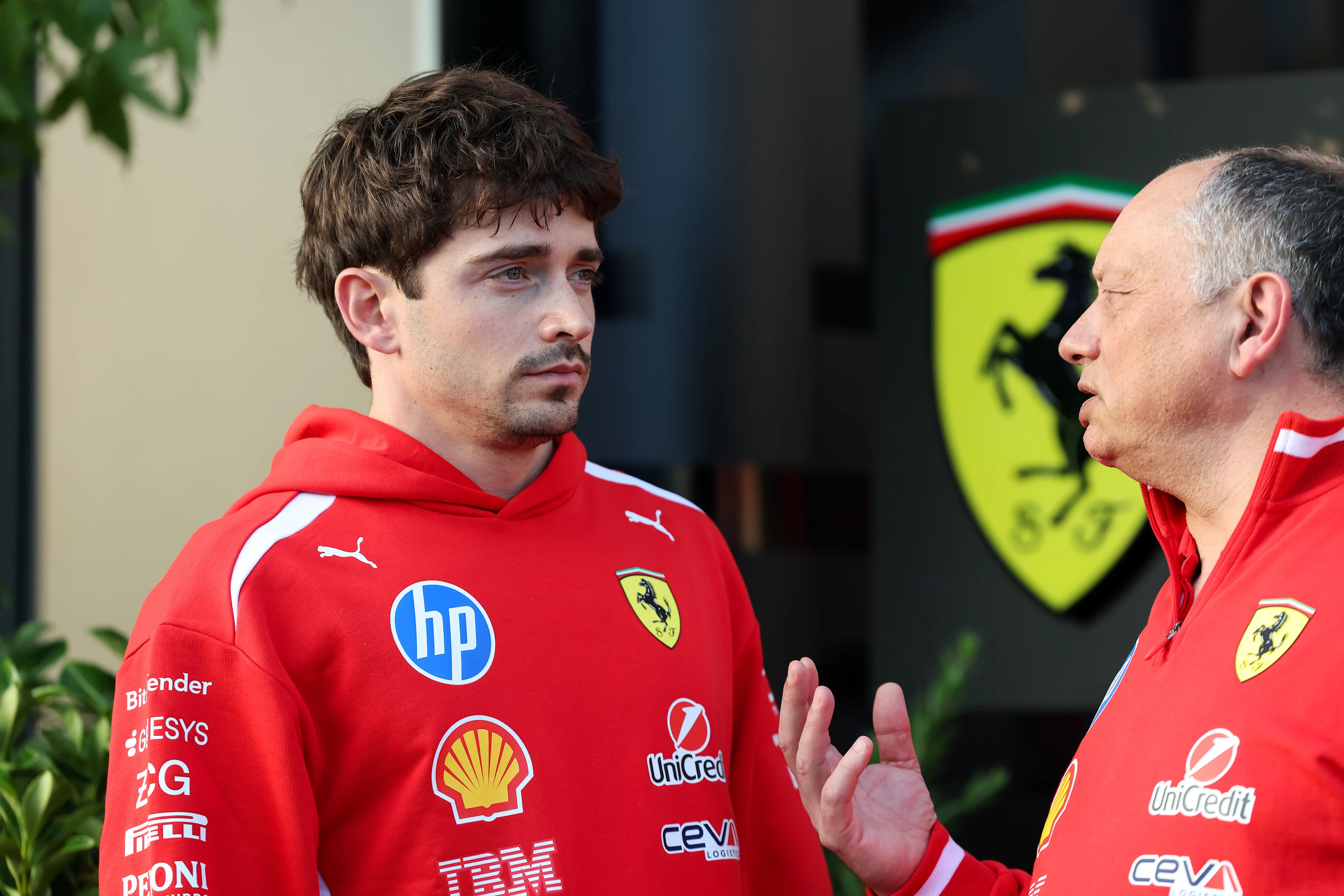MELBOURNE, AUSTRALIA - MARCH 04: Charles Leclerc of Monaco and Scuderia Ferrari talks with Frederic
