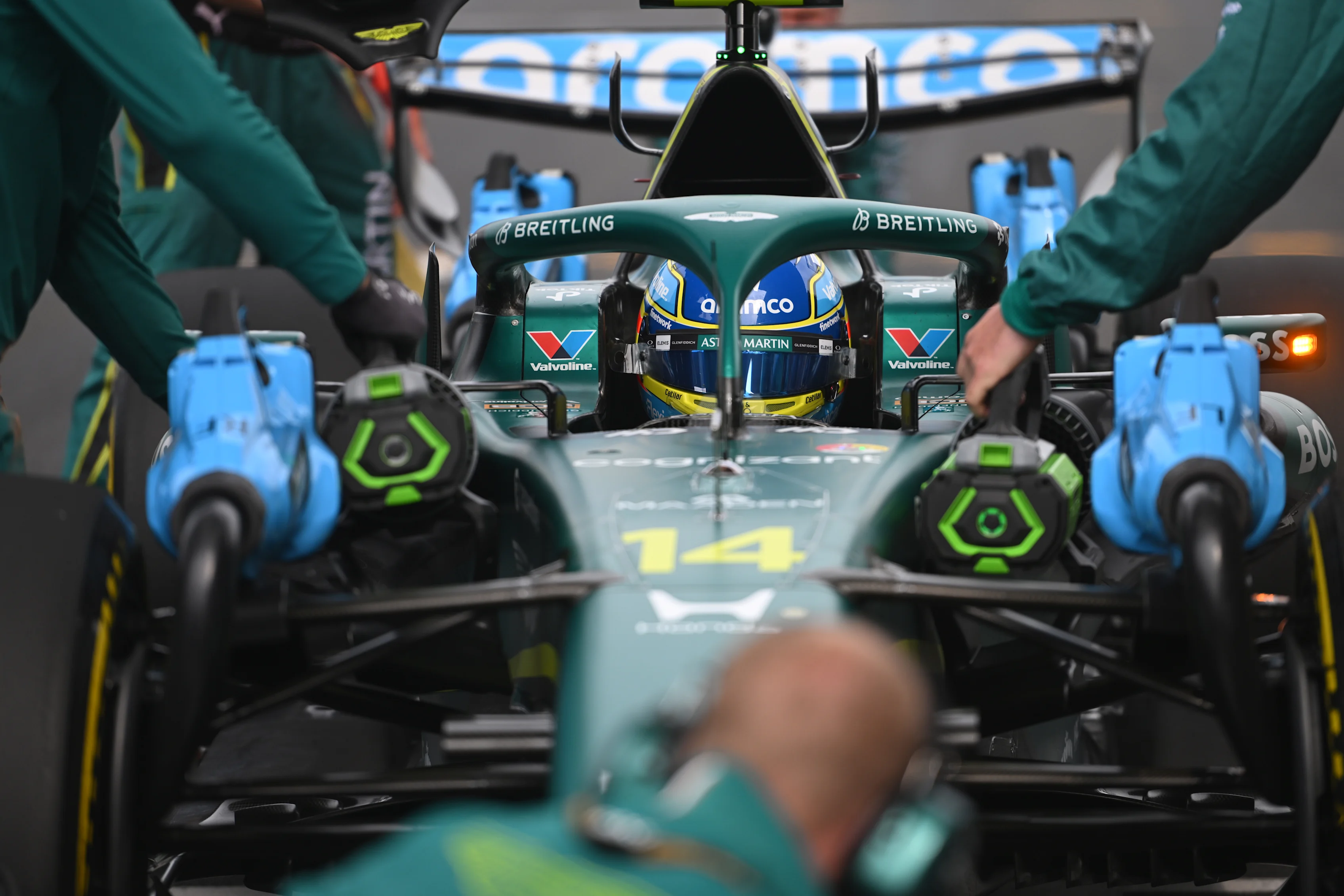 SHANGHAI, CHINA - MARCH 15: Fernando Alonso of Spain and Aston Martin F1 Team arrives on the grid