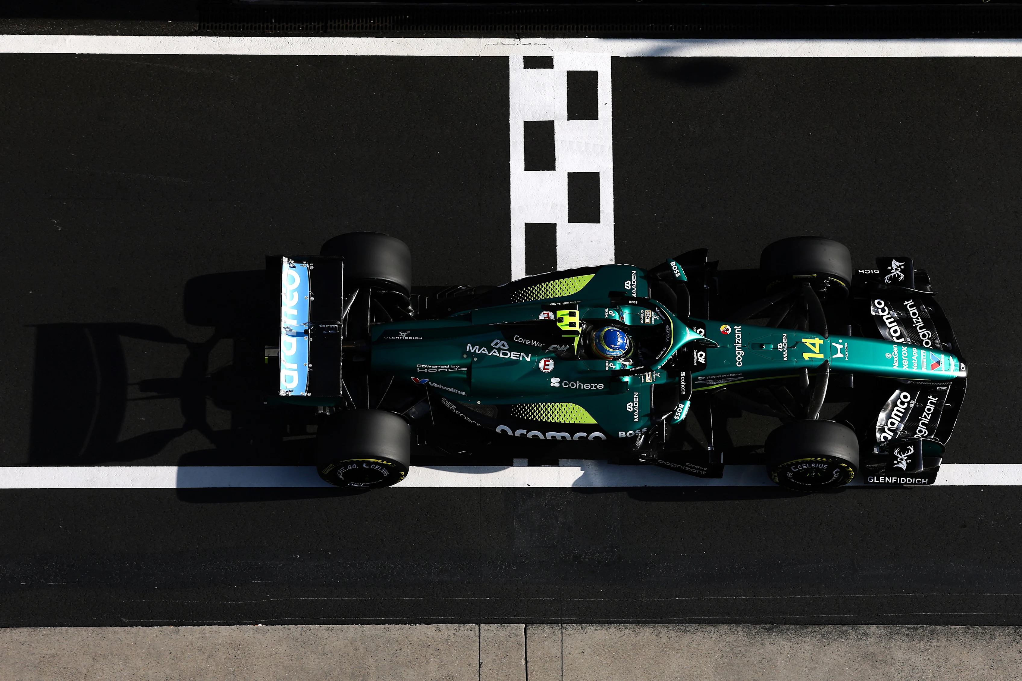 SHANGHAI, CHINA - MARCH 13: Fernando Alonso of Spain driving the (14) Aston Martin F1 Team AMR26