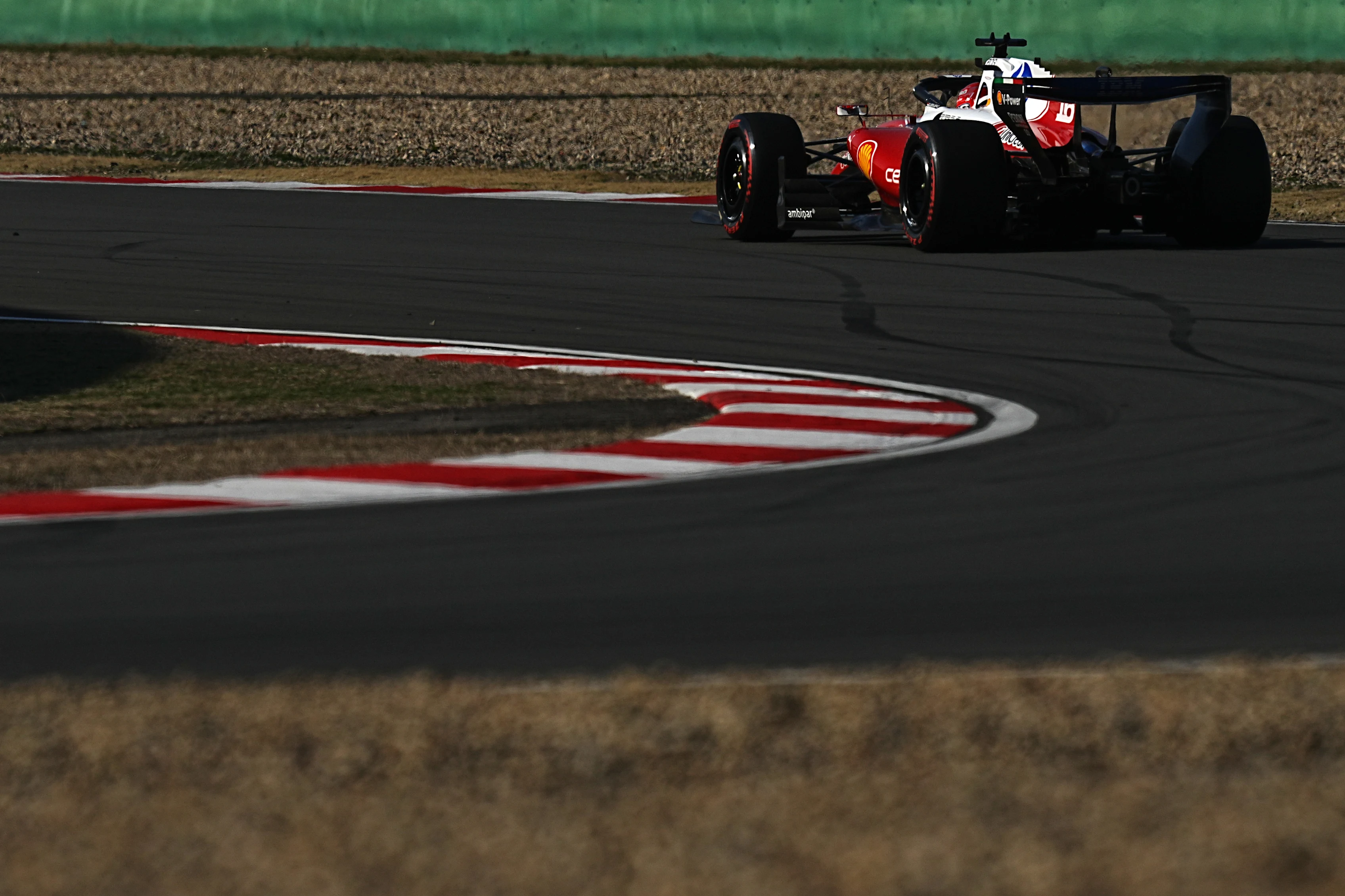 SHANGHAI, CHINA - MARCH 14: Nico Hulkenberg of Germany driving the (27) Audi F1 Team R26 leaves the