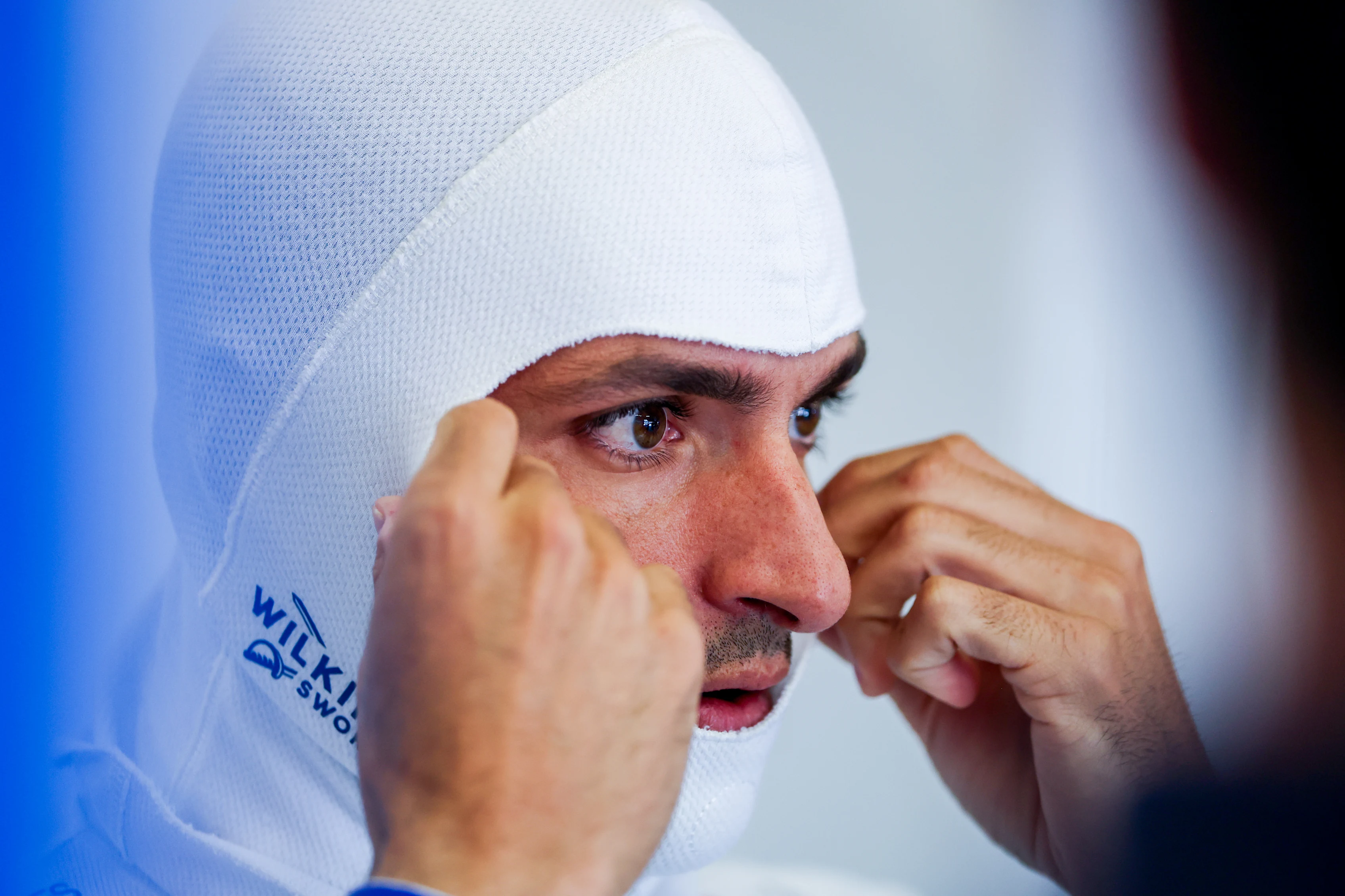 SHANGHAI, CHINA - MARCH 14: Carlos Sainz of Spain and Williams prepares to drive in the garage