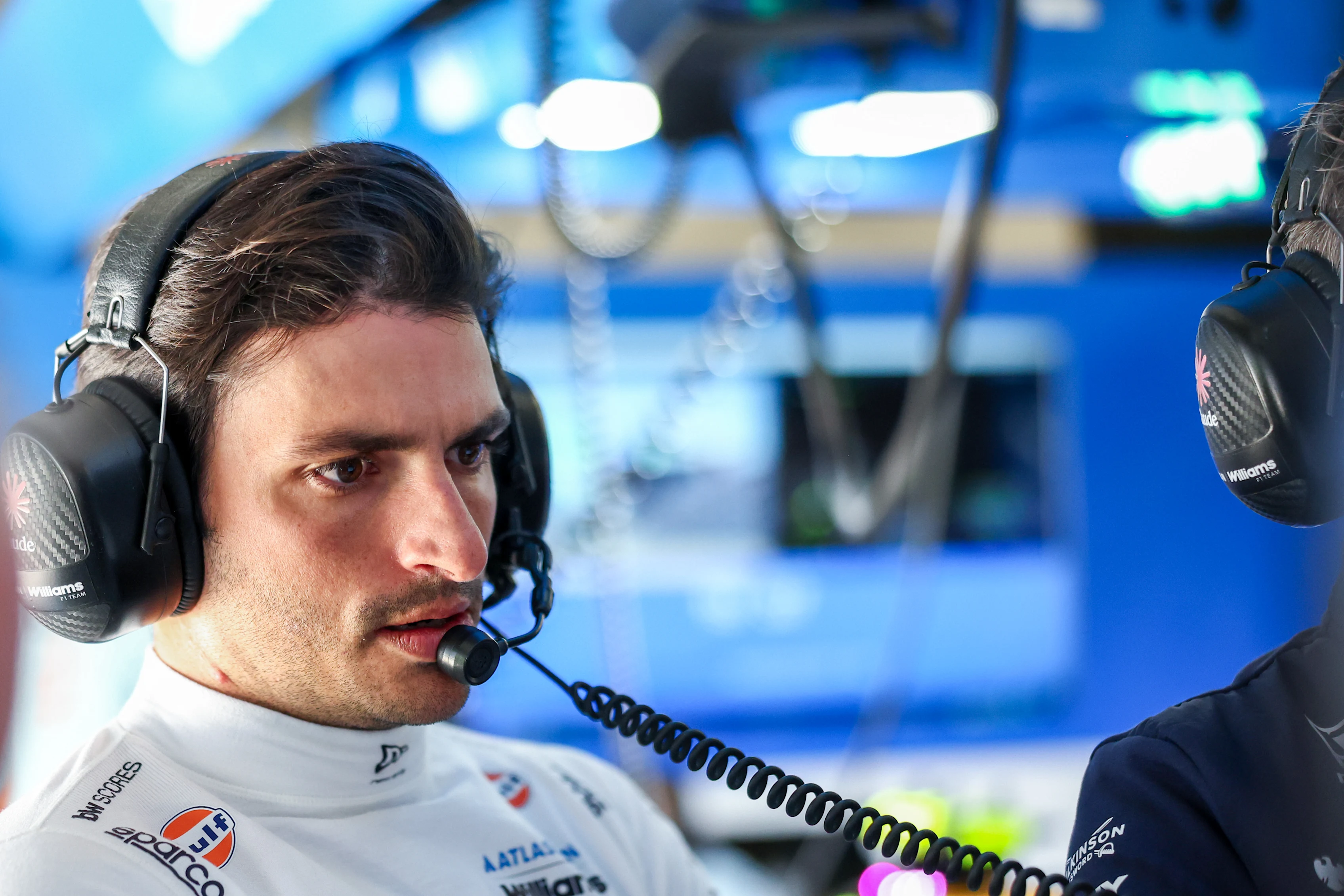 SHANGHAI, CHINA - MARCH 14: Carlos Sainz of Spain and Williams looks on in the garage during