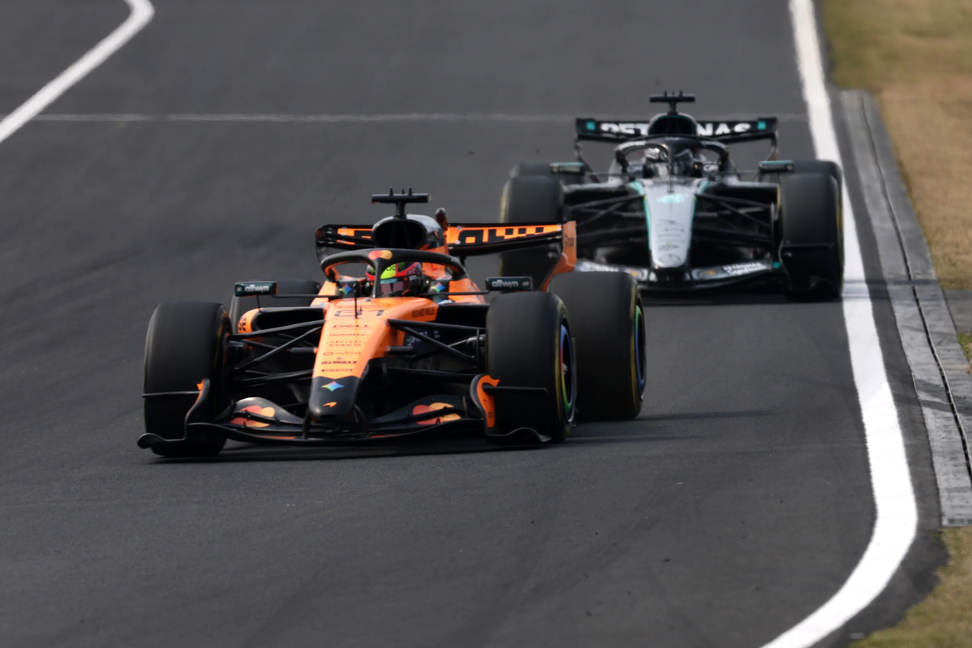 SUZUKA, JAPAN - MARCH 29: Oscar Piastri of Australia driving the (81) McLaren MCL40 Mercedes leads