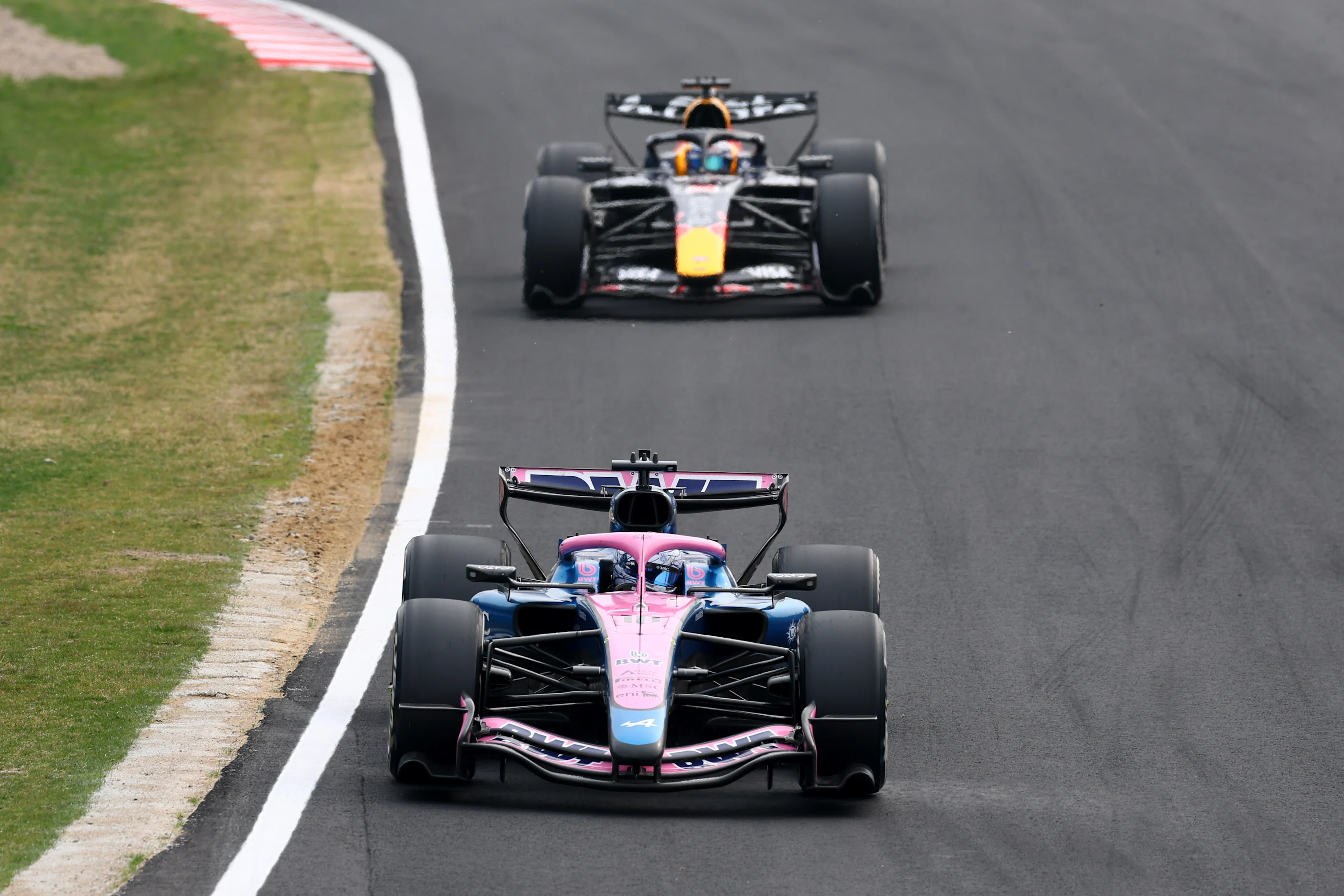 SUZUKA, JAPAN - MARCH 29: Pierre Gasly of France driving the (10) Alpine F1 A526 Mercedes leads Max