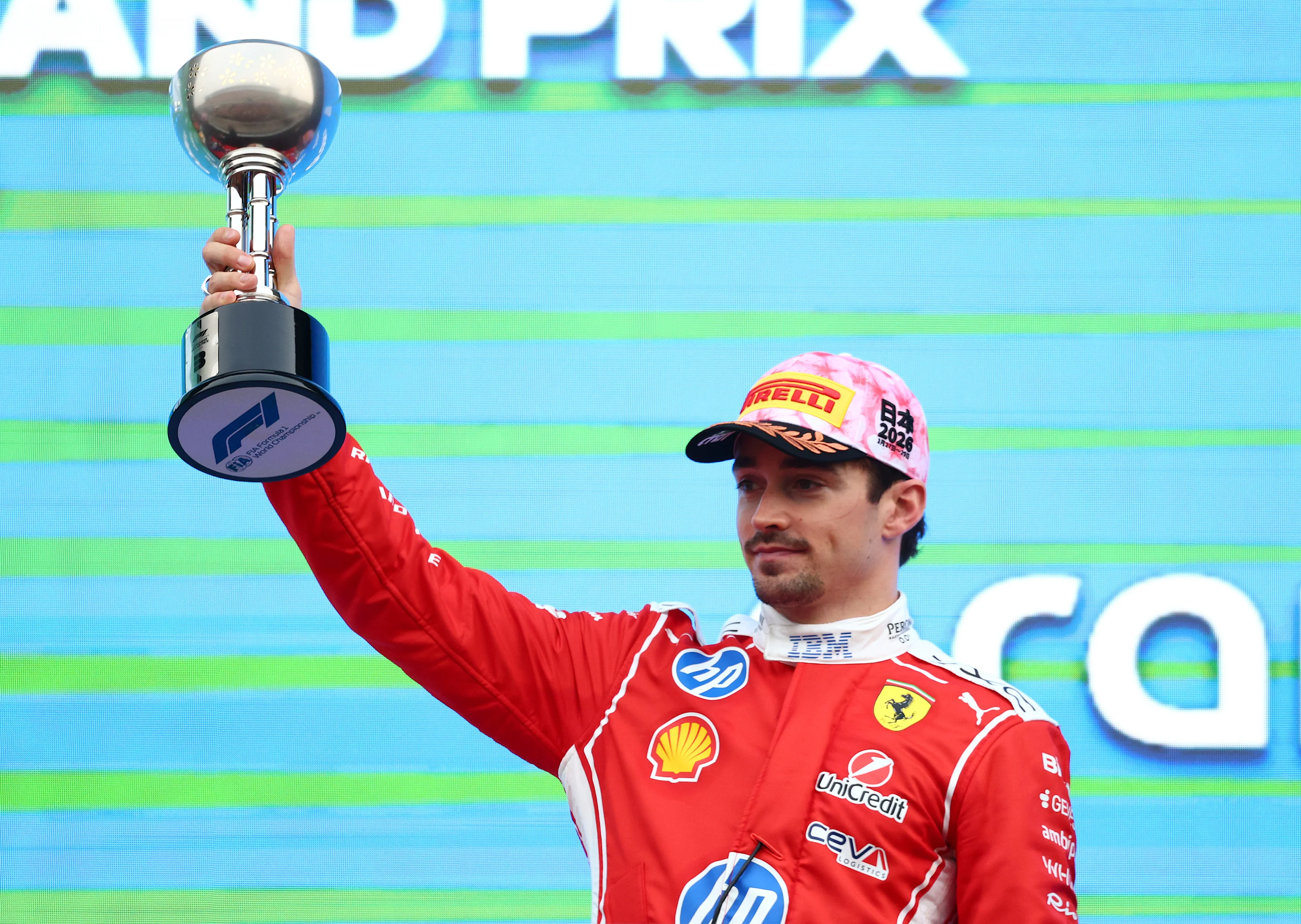 SUZUKA, JAPAN - MARCH 29: Third placed Charles Leclerc of Monaco and Scuderia Ferrari lifts his