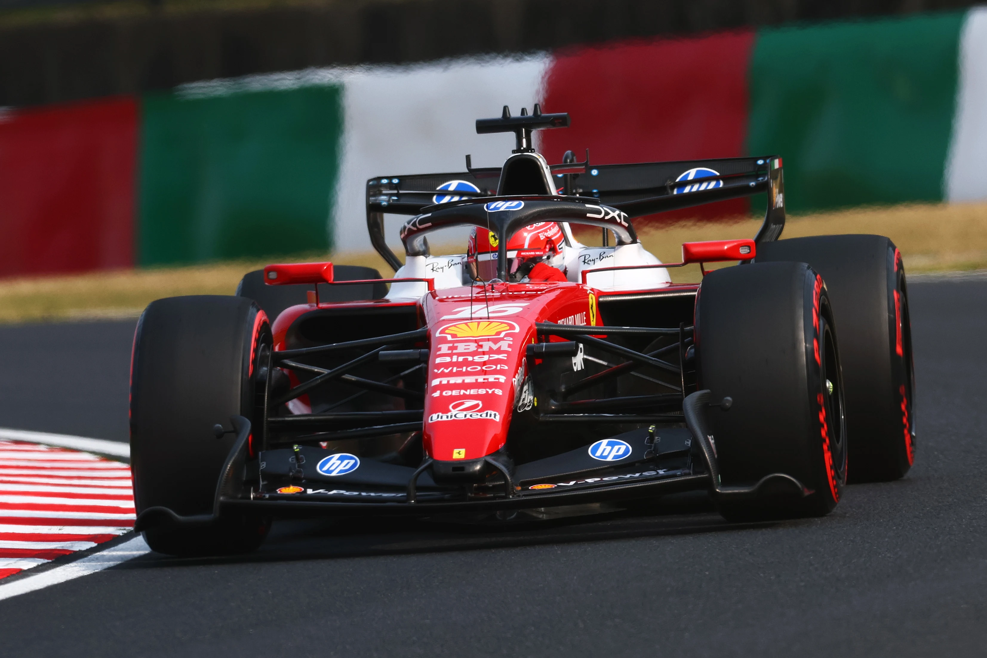 SUZUKA, JAPAN - MARCH 28: Charles Leclerc of Monaco driving the (16) Scuderia Ferrari SF-26 on
