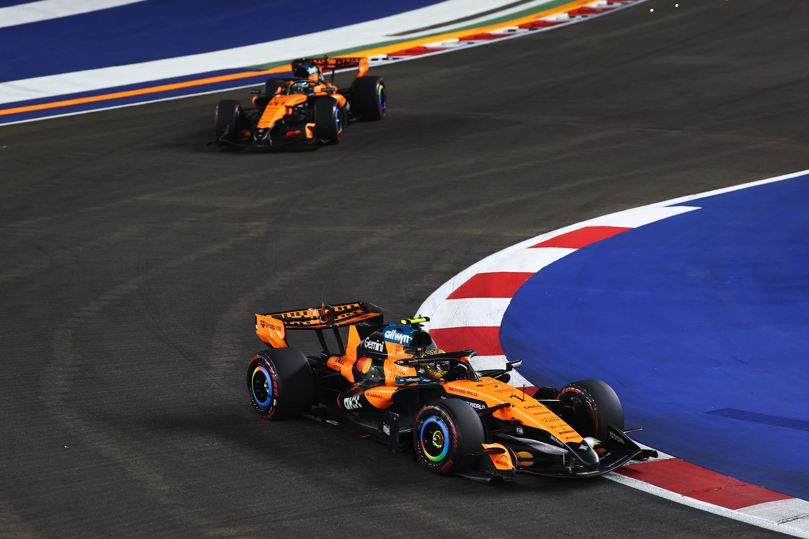 SINGAPORE, SINGAPORE - OCTOBER 11: Lando Norris of Great Britain driving the (1) McLaren MCL40