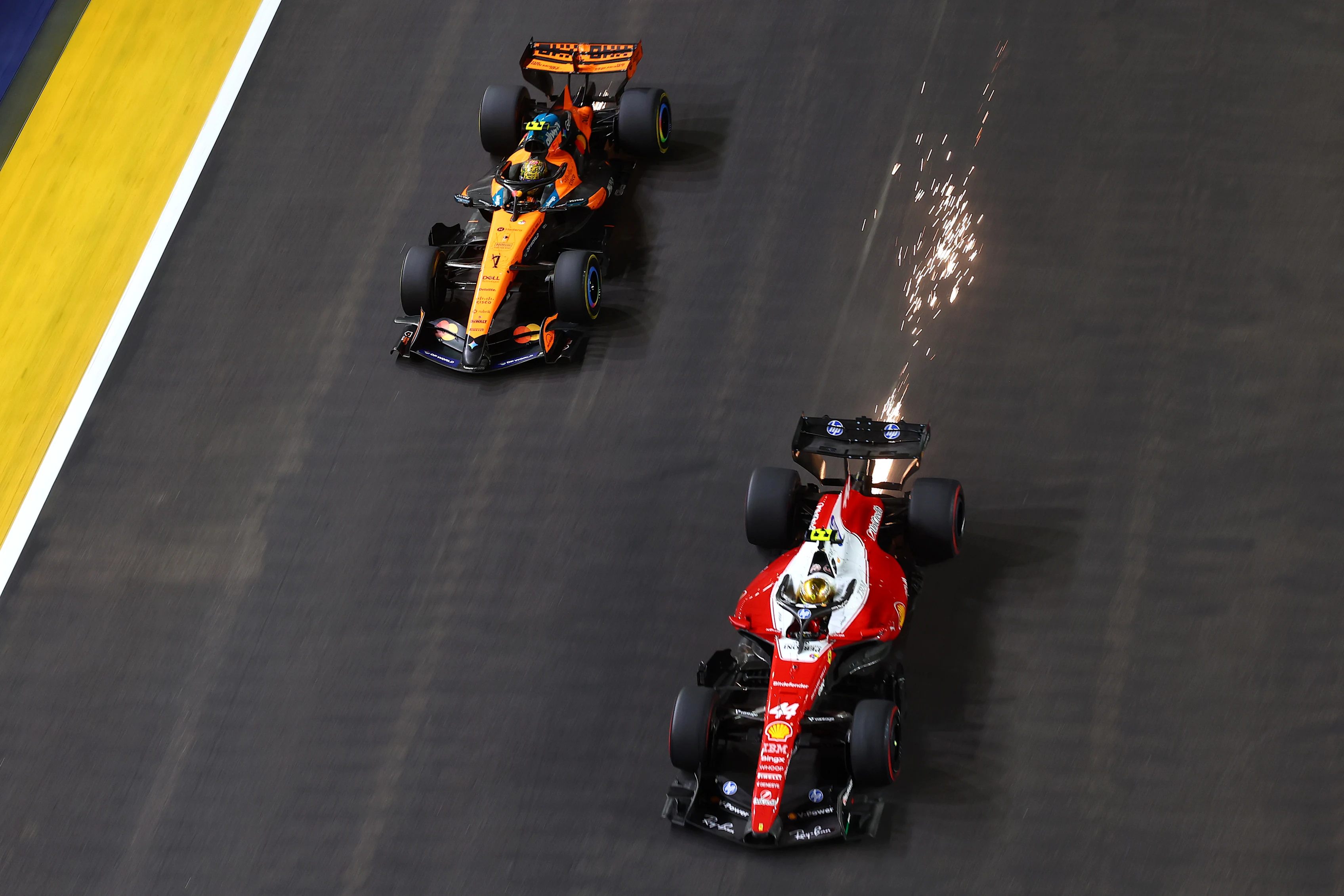 SINGAPORE, SINGAPORE - OCTOBER 11: Lewis Hamilton of Great Britain driving the (44) Scuderia