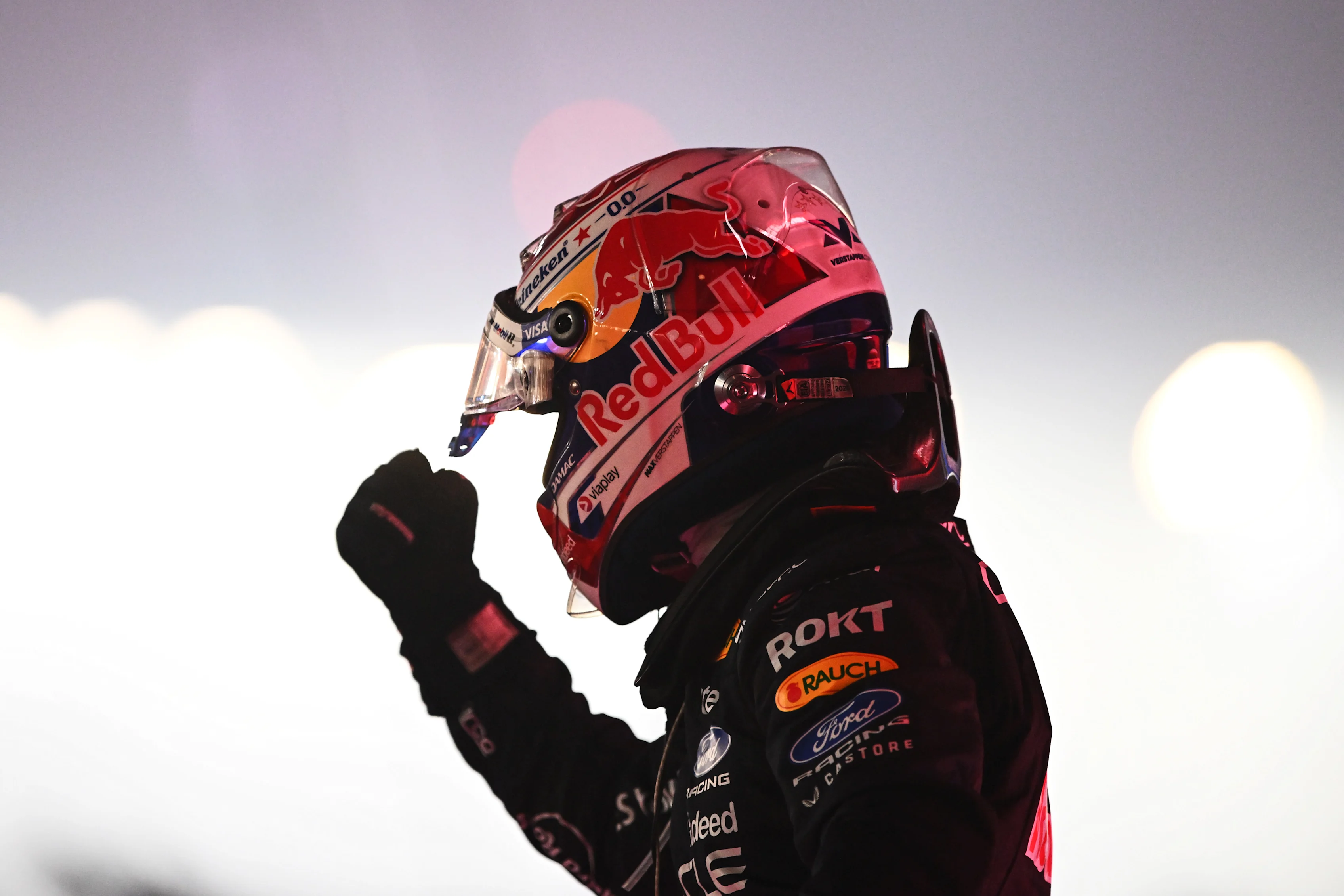 SINGAPORE, SINGAPORE - OCTOBER 11: Race winner Max Verstappen of the Netherlands and Oracle Red