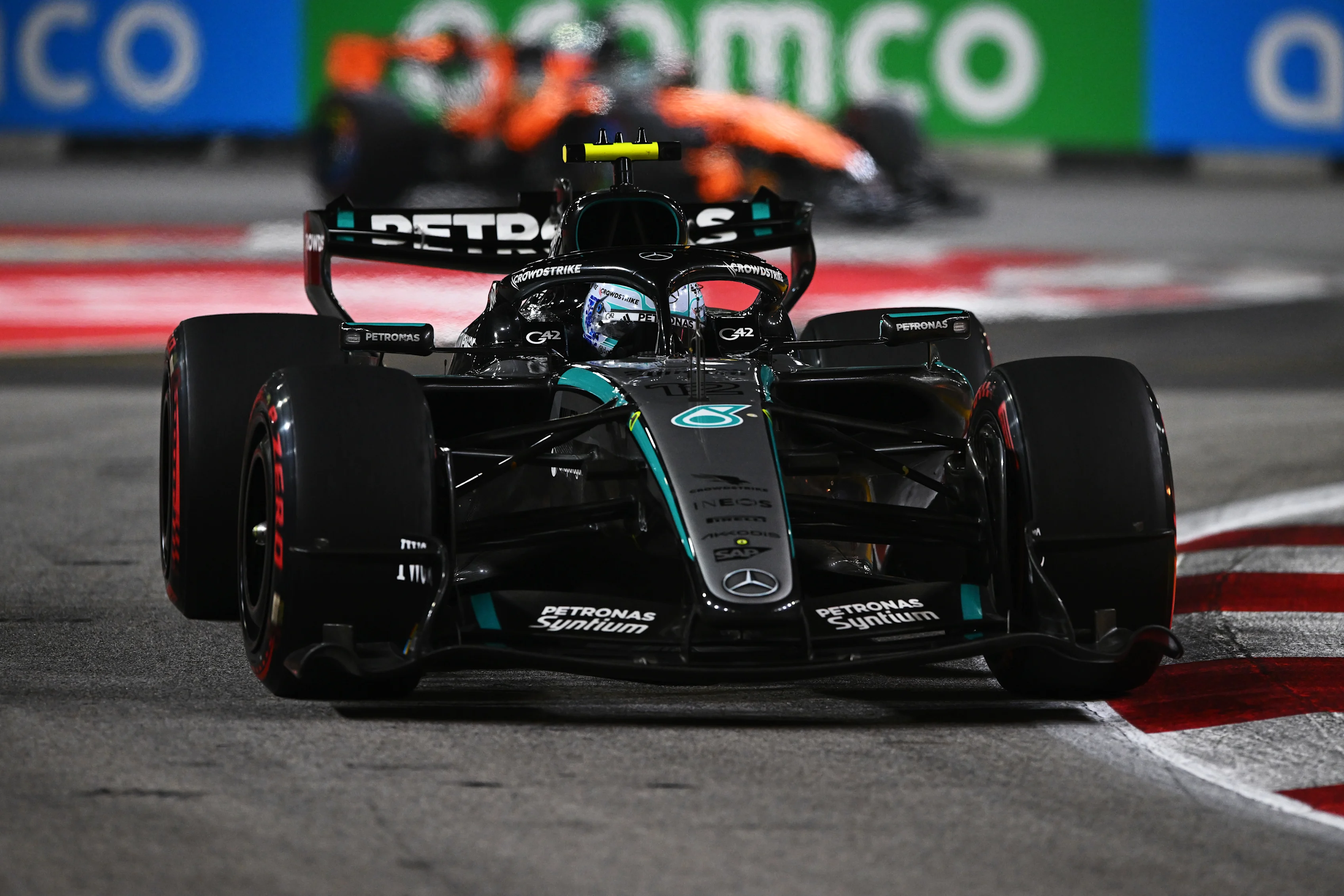 SINGAPORE, SINGAPORE - OCTOBER 11: Andrea Kimi Antonelli of Italy driving the (12) Mercedes AMG