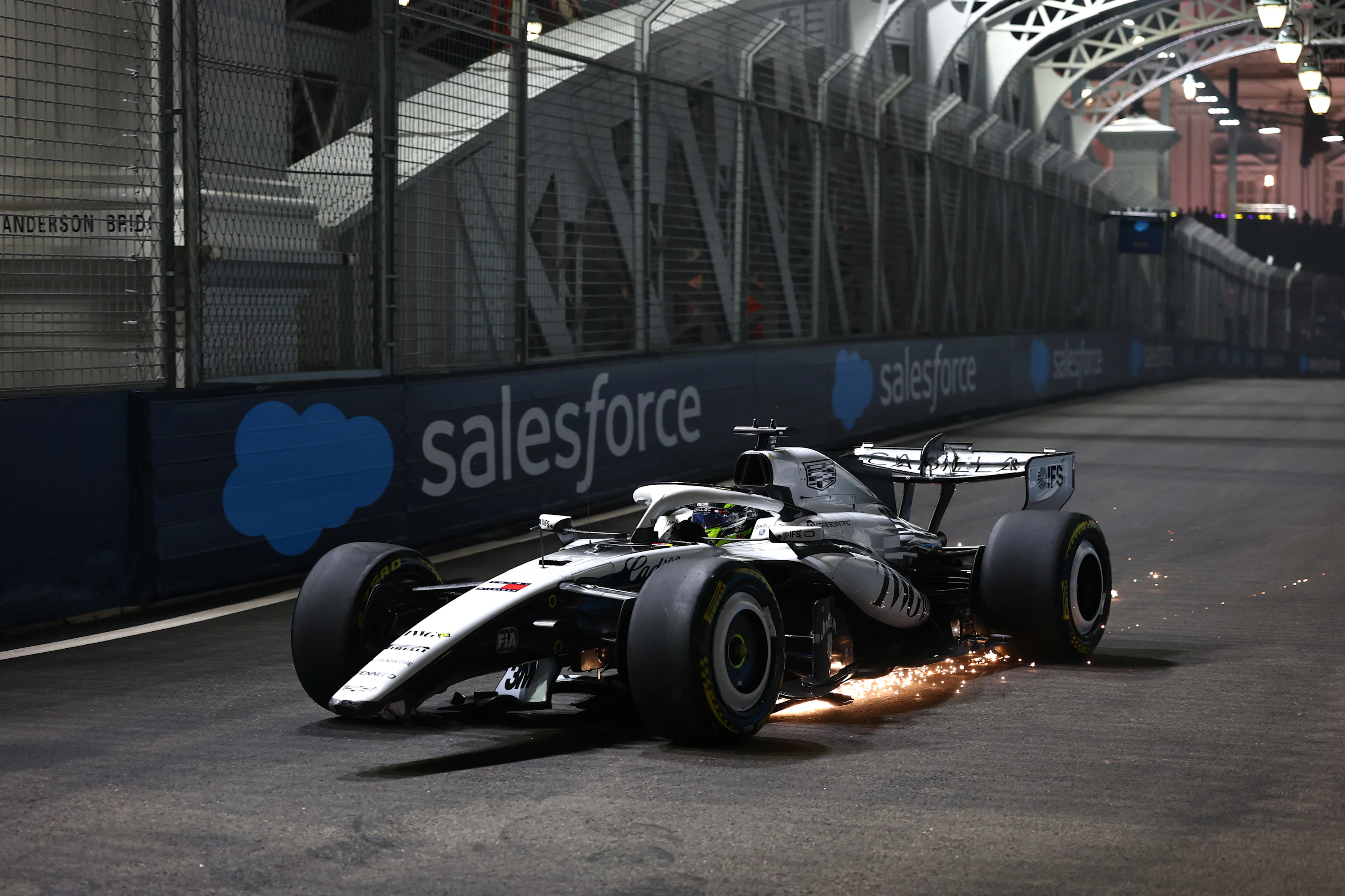 SINGAPORE, SINGAPORE - OCTOBER 09: Sergio Perez of Mexico driving the (11) Cadillac F1 Team MAC-26