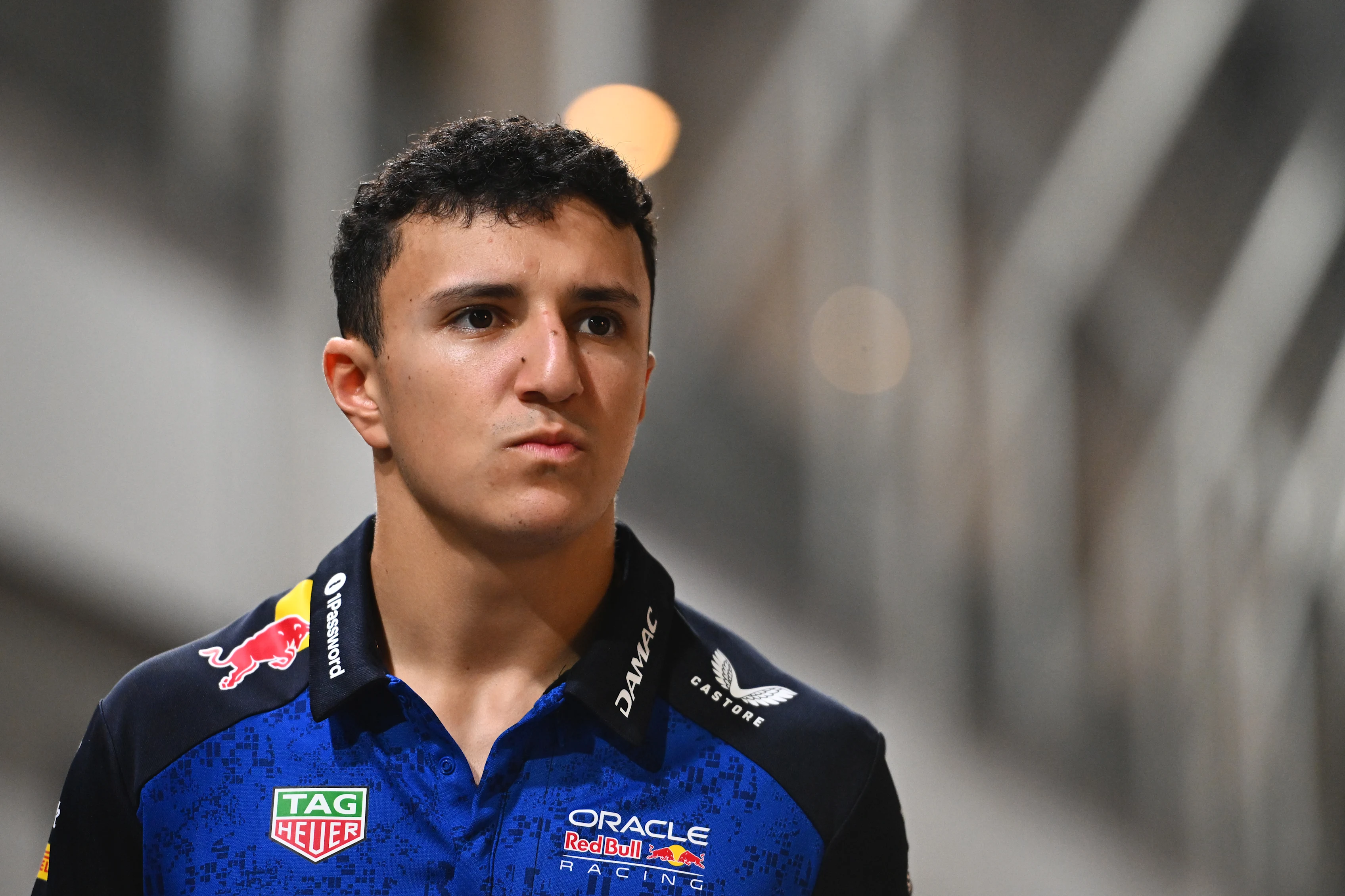 SINGAPORE, SINGAPORE - OCTOBER 08: Isack Hadjar of France and Oracle Red Bull Racing walks in the