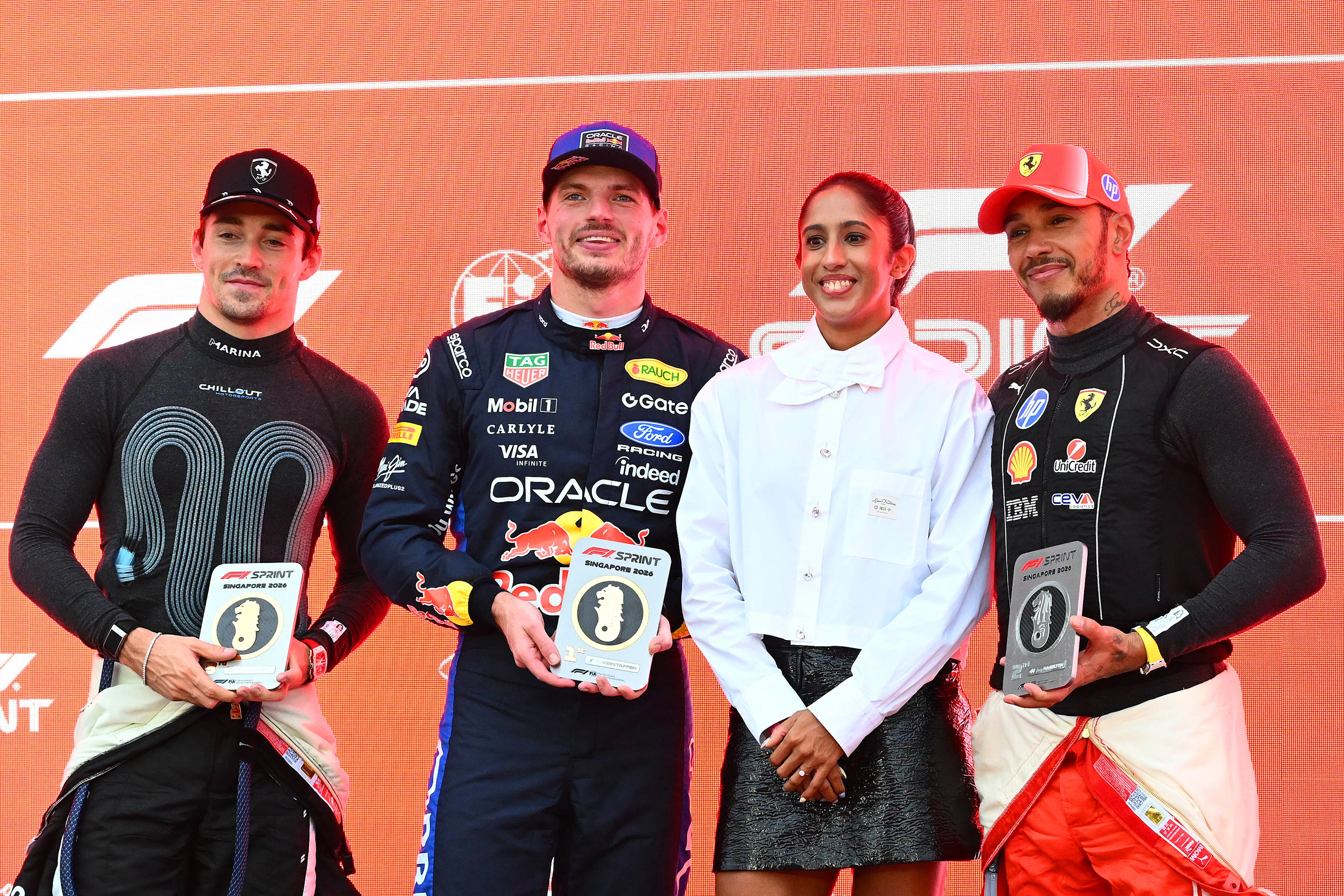 SINGAPORE, SINGAPORE - OCTOBER 10: Sprint winner Max Verstappen of the Netherlands and Oracle Red