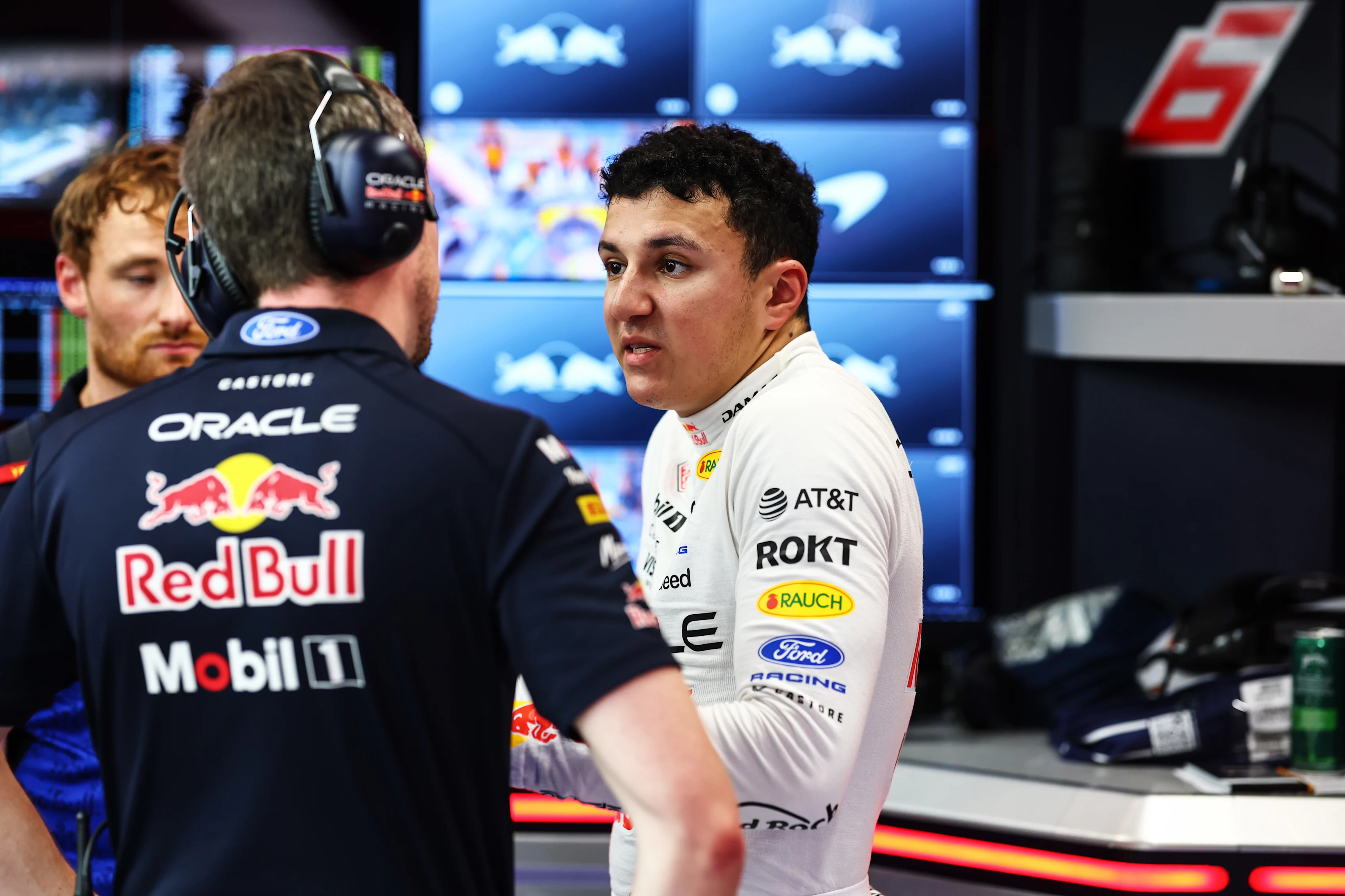 SINGAPORE, SINGAPORE - OCTOBER 10: Isack Hadjar of France driving the (6) Oracle Red Bull Racing