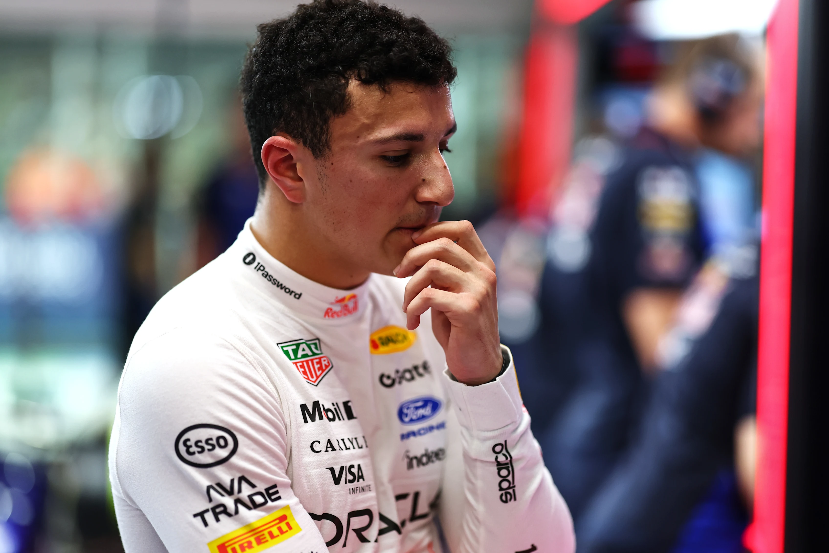 SINGAPORE, SINGAPORE - OCTOBER 10: Isack Hadjar of France and Oracle Red Bull Racing looks dejected