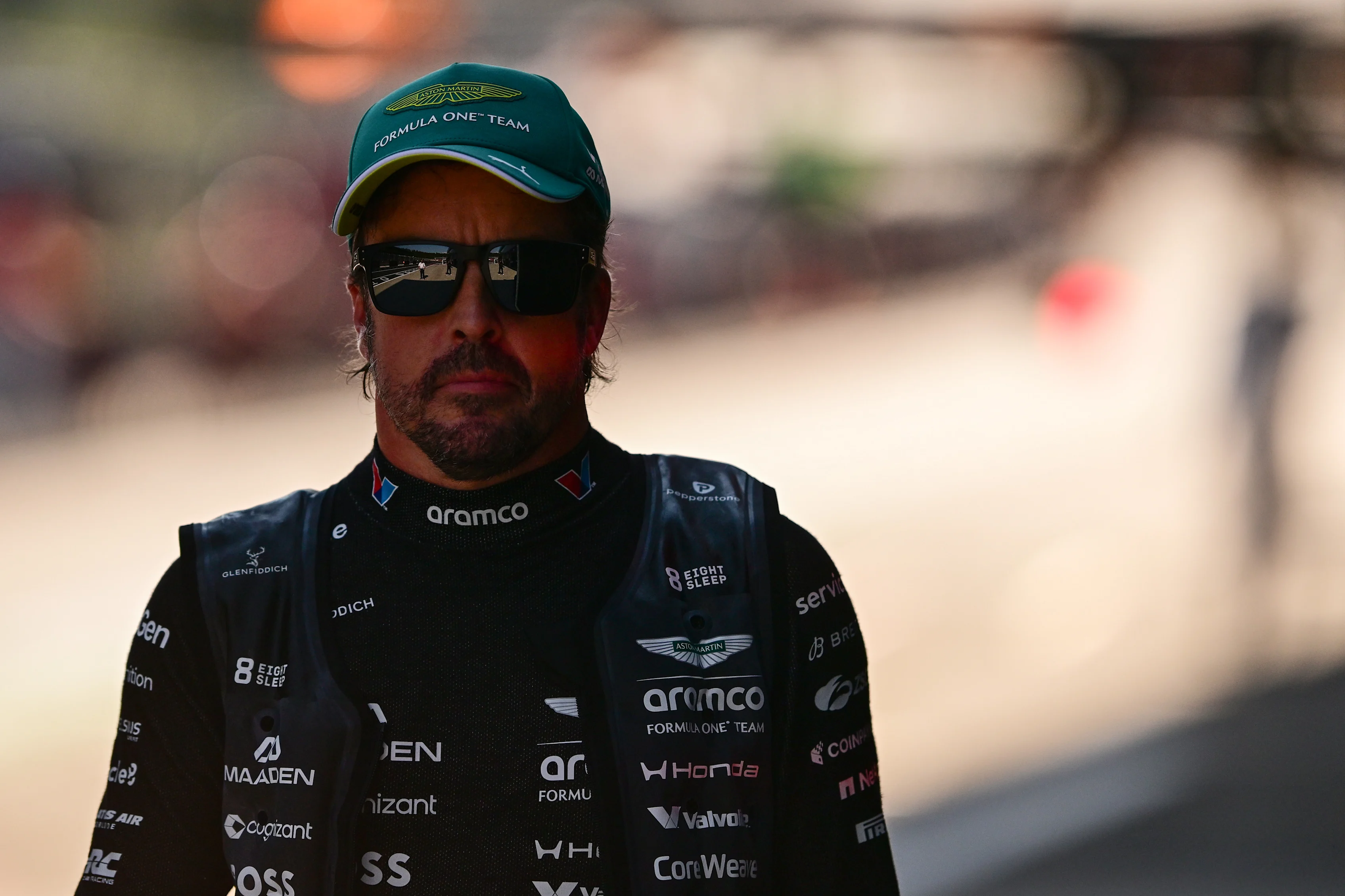 SPIELBERG, AUSTRIA - JUNE 27: Twenty-first placed qualifier Fernando Alonso of Spain and Aston