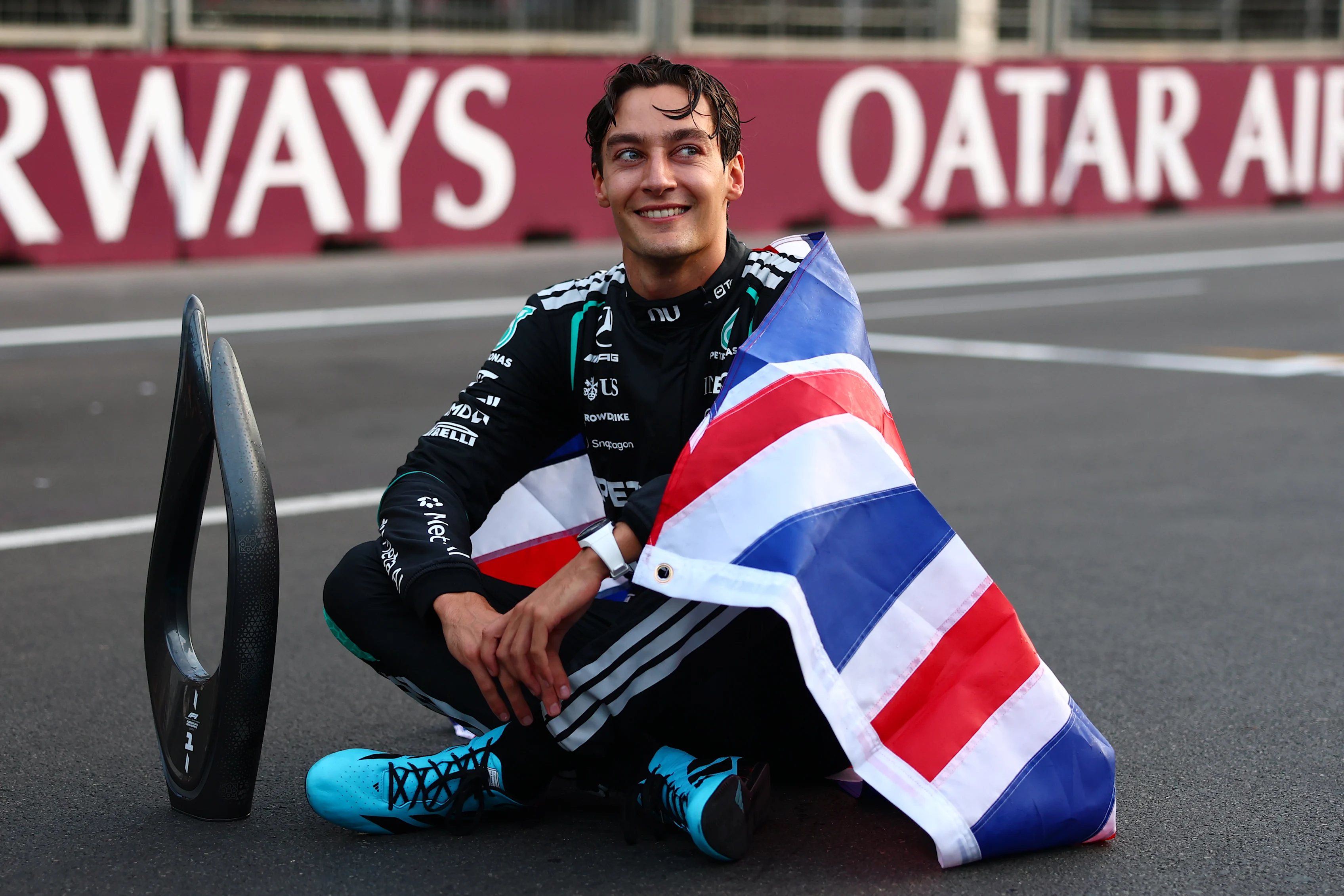 BAKU, AZERBAIJAN - SEPTEMBER 26: Race winner George Russell of Great Britain and Mercedes AMG