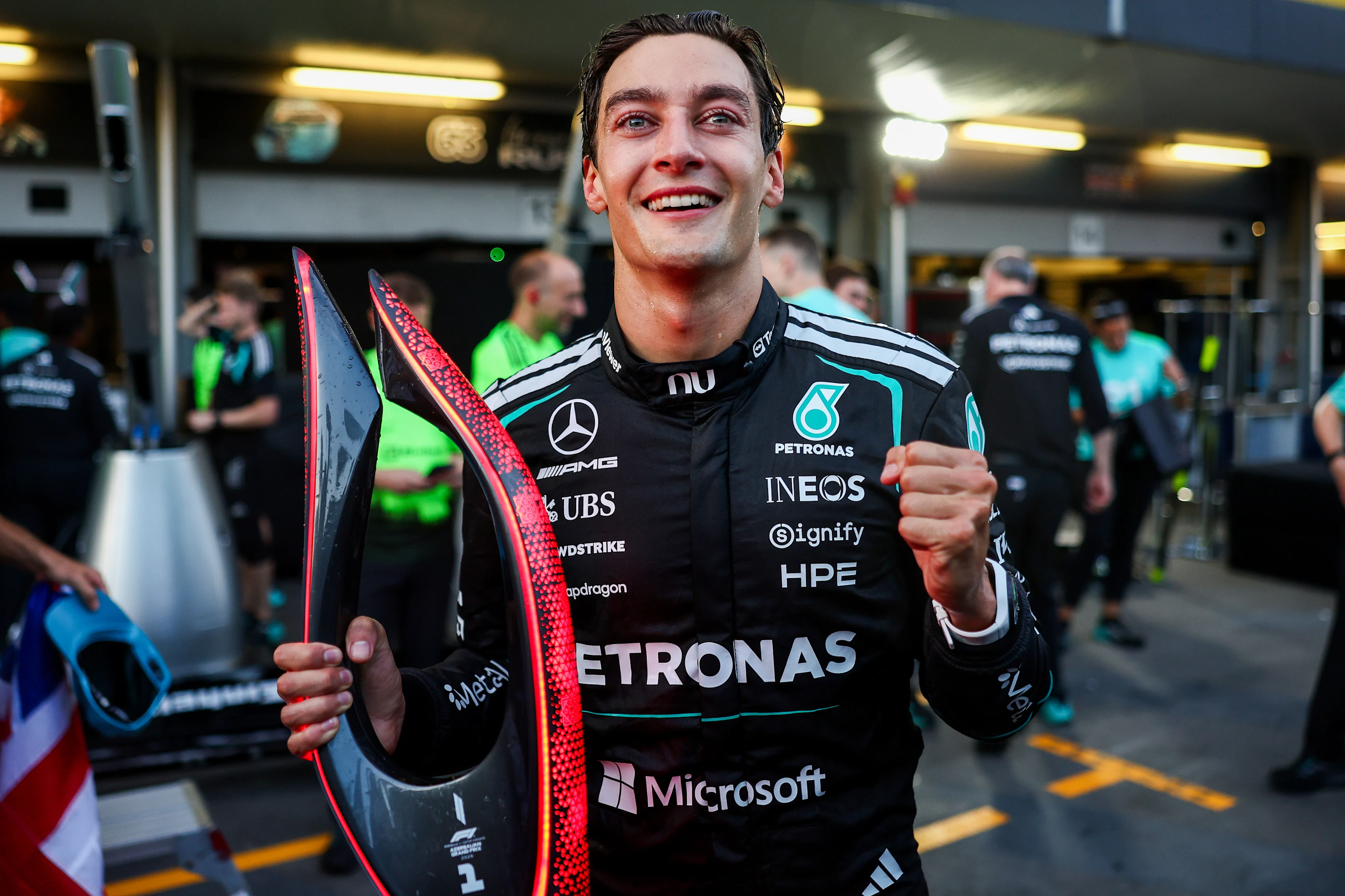 BAKU, AZERBAIJAN - SEPTEMBER 26: Race winner George Russell of Great Britain and Mercedes AMG