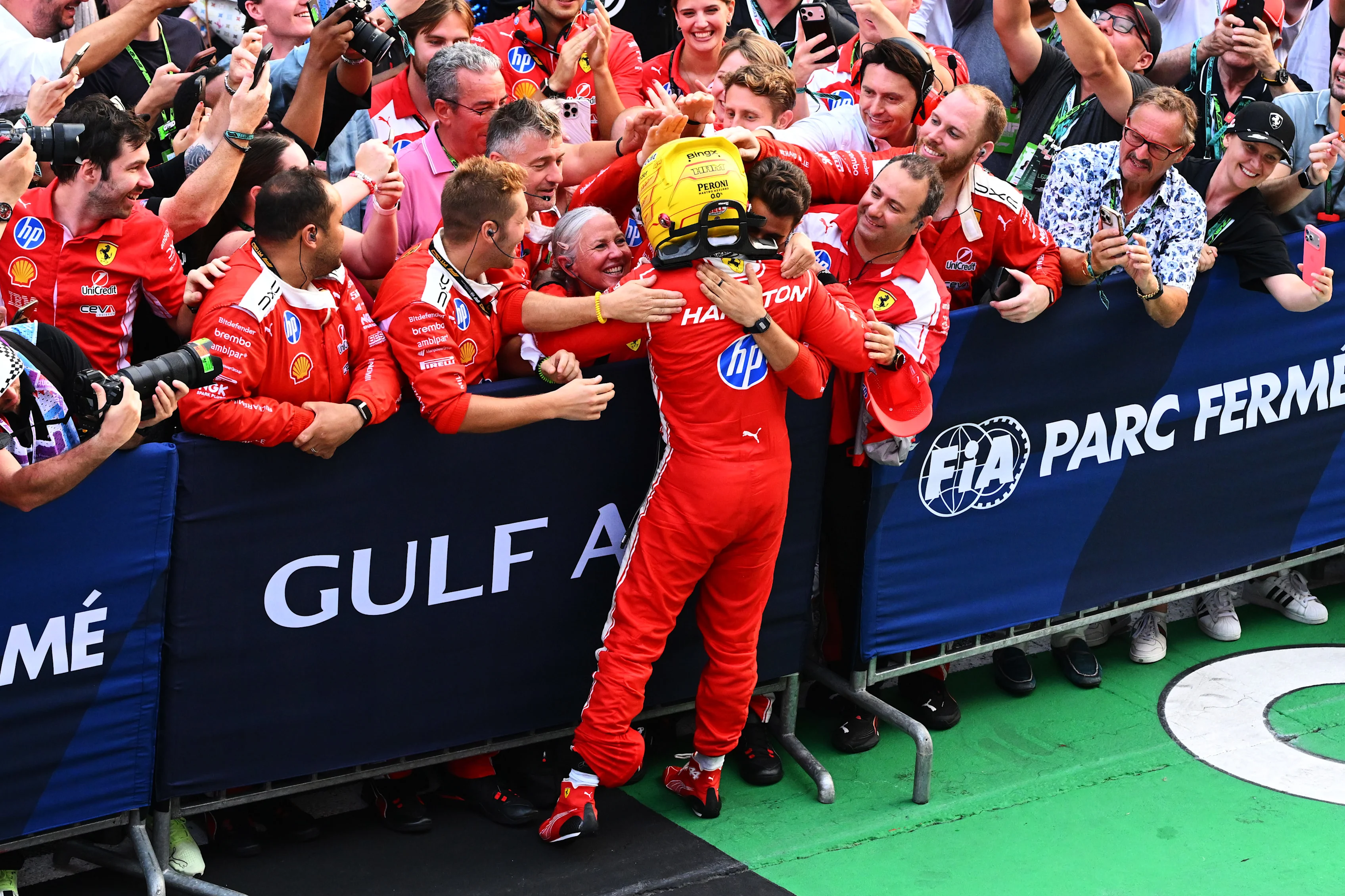 KUALA LUMPUR, MALAYSIA - OCTOBER 04: Third placed Lewis Hamilton of Great Britain and Scuderia
