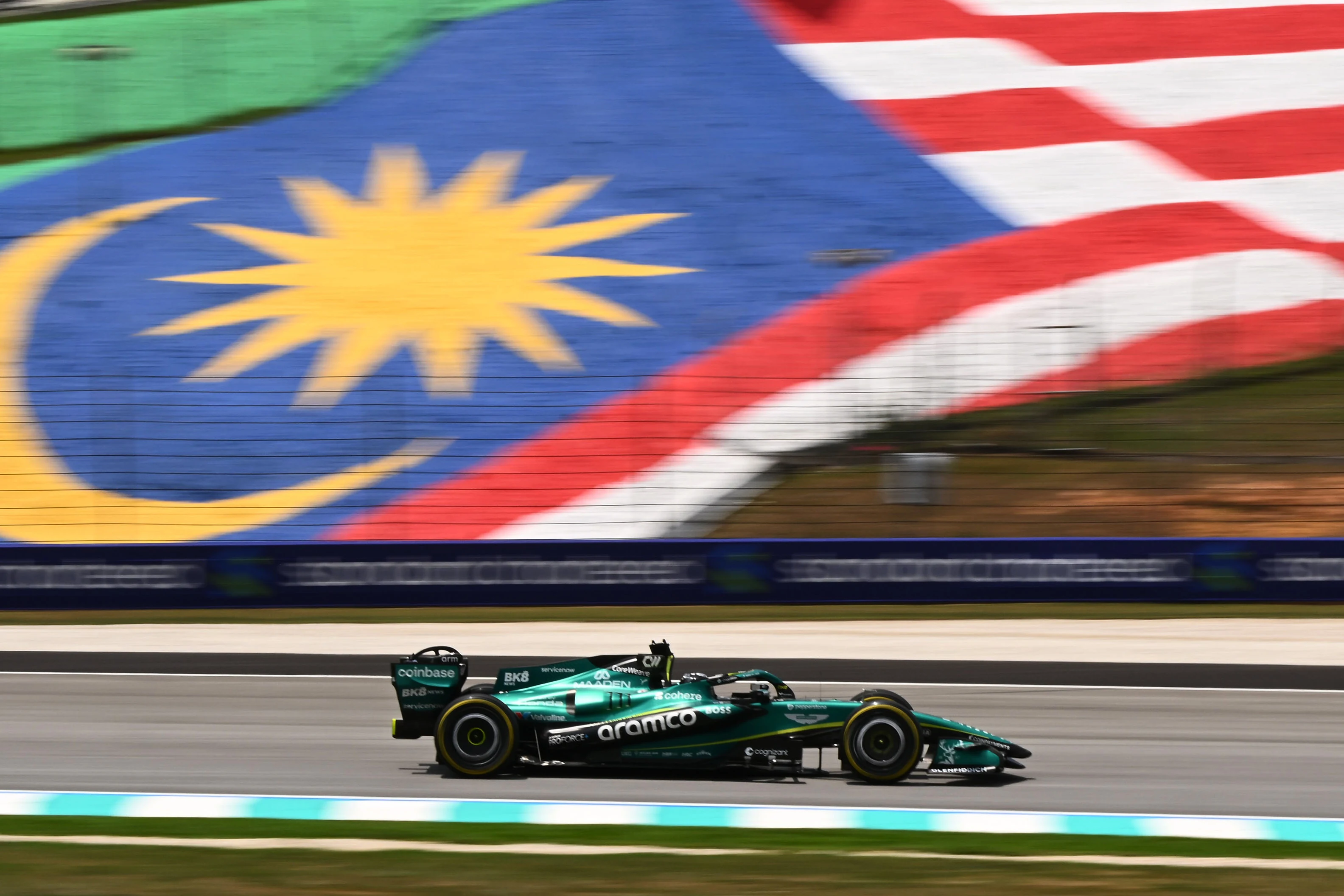 KUALA LUMPUR, MALAYSIA - OCTOBER 02: Lance Stroll of Canada driving the (18) Aston Martin F1 Team