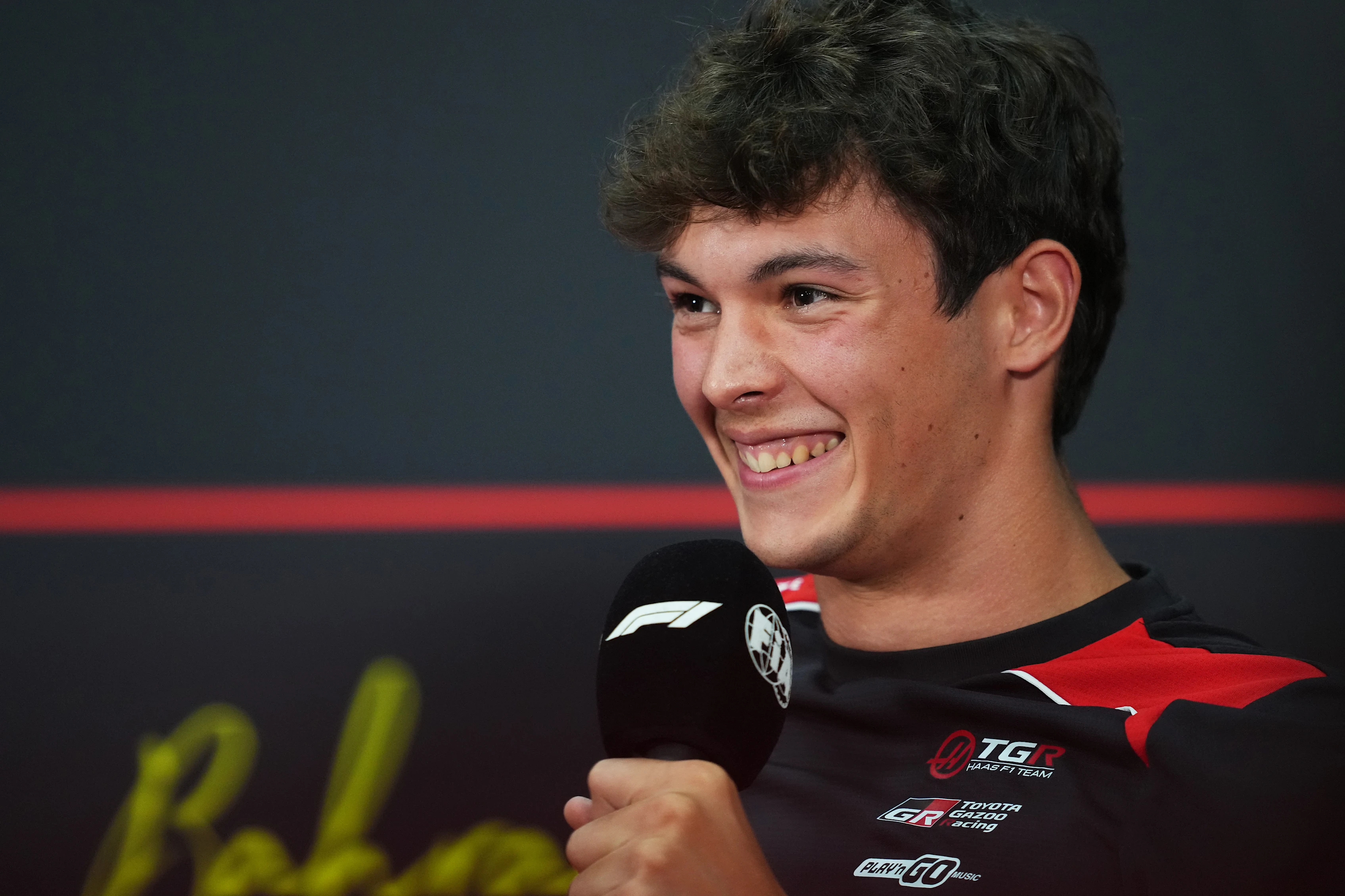 KUALA LUMPUR, MALAYSIA - OCTOBER 01: Oliver Bearman of Great Britain and Haas F1 speaks in the