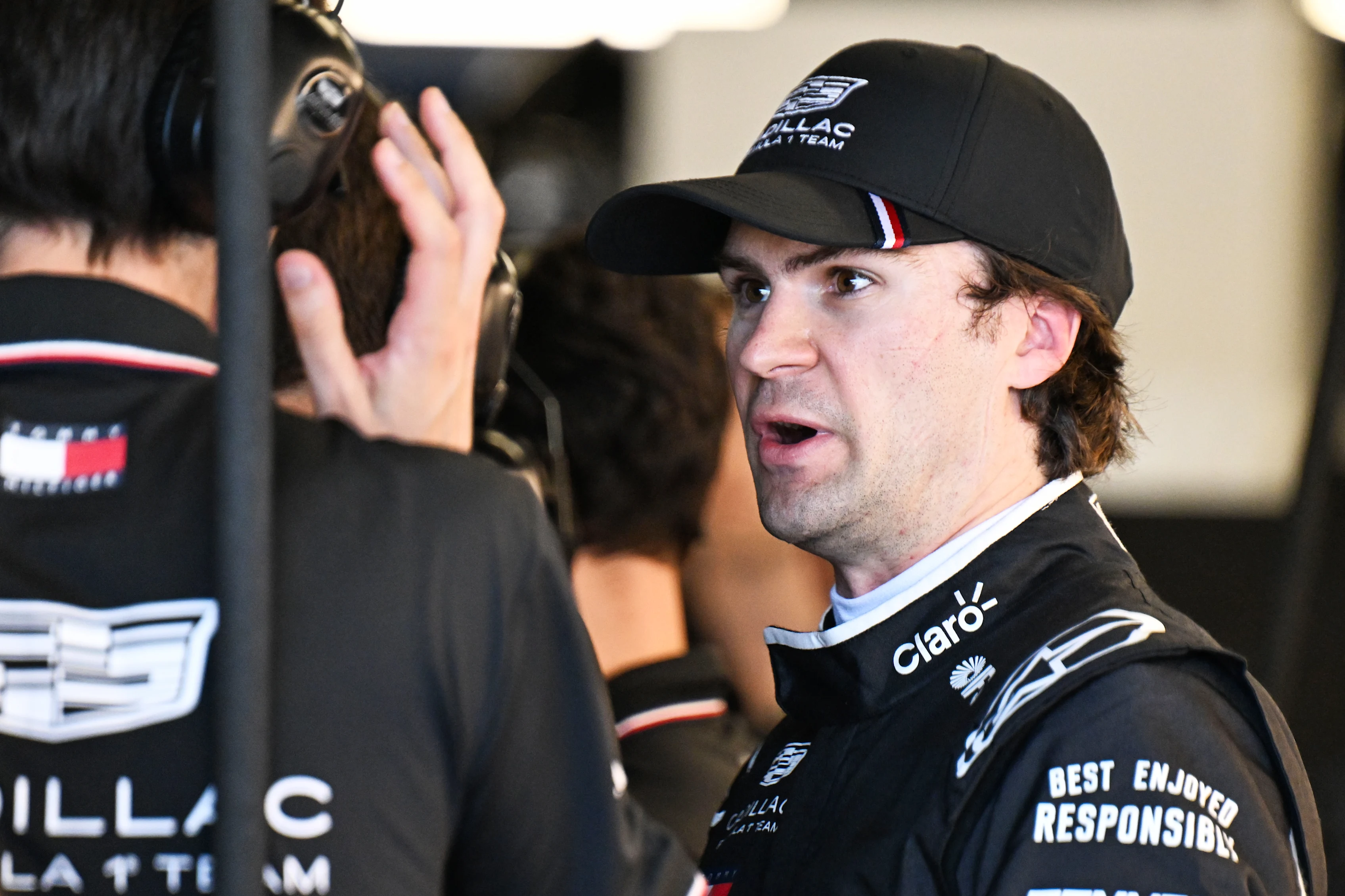BARCELONA, SPAIN - JUNE 12: Colton Herta of United States and Cadillac F1 Team talks in the garage