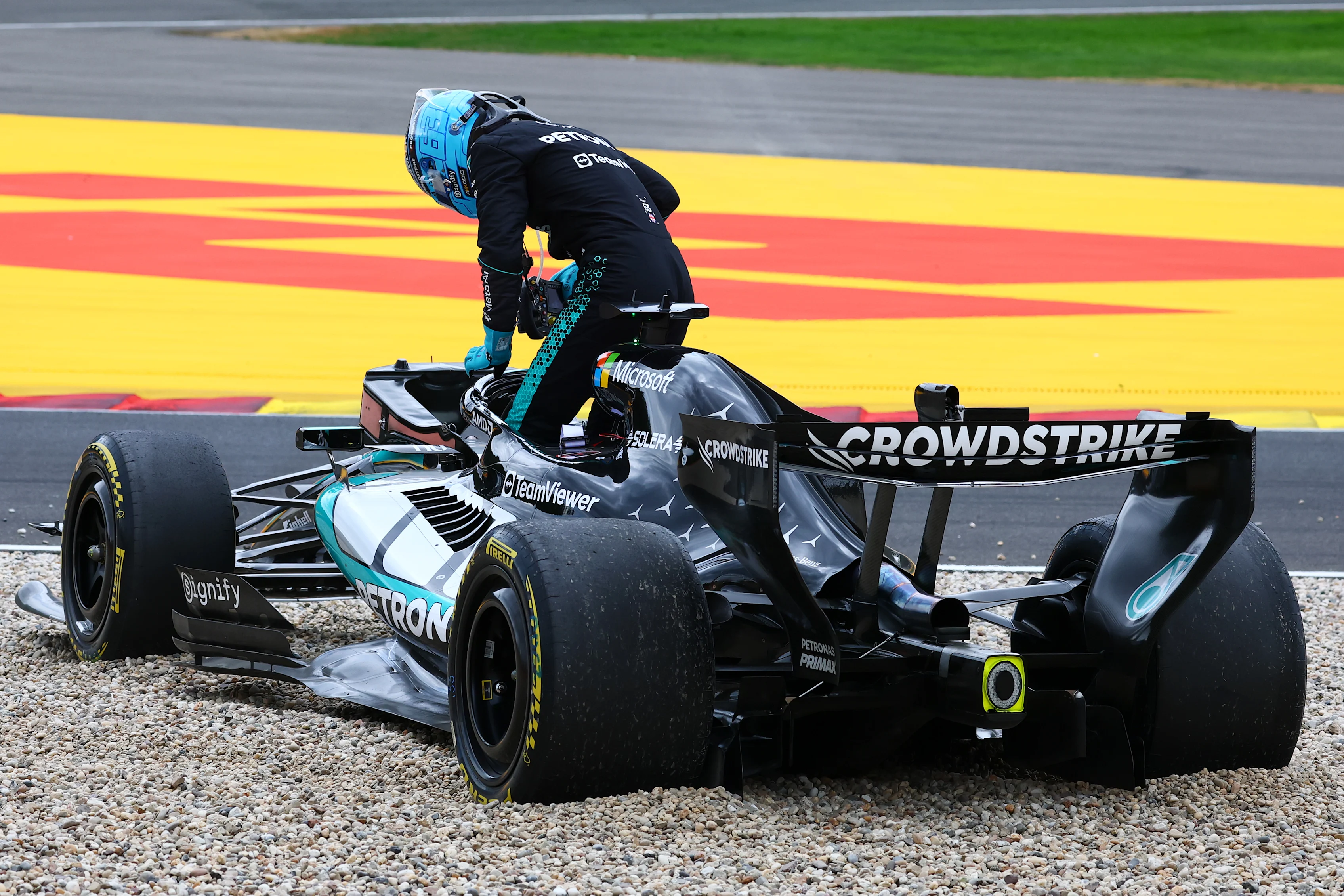 SPA, BELGIUM - JULY 19: George Russell of Great Britain and Mercedes AMG Petronas F1 Team climbs