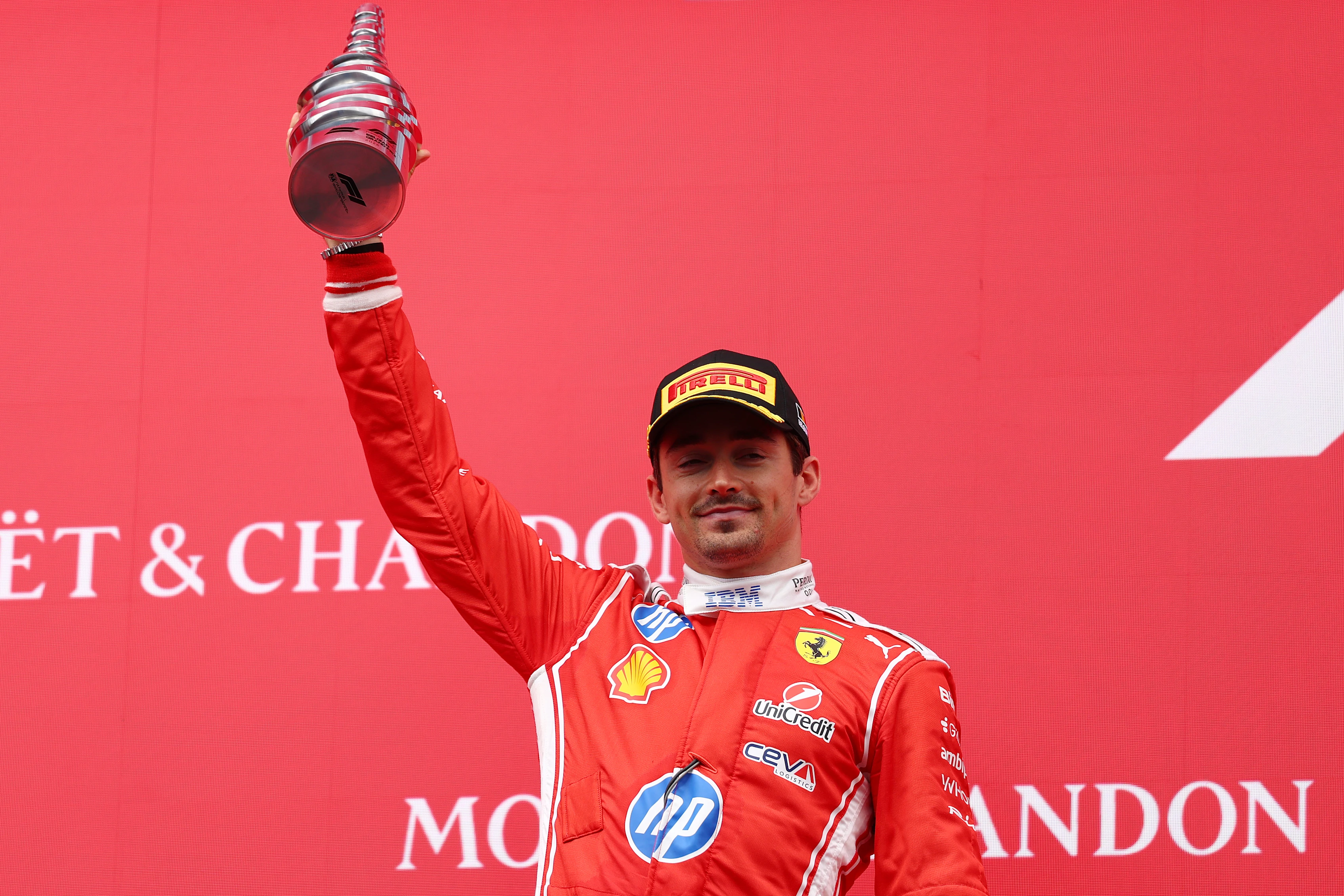 SPA, BELGIUM - JULY 19: Second placed Charles Leclerc of Monaco and Scuderia Ferrari lifts his