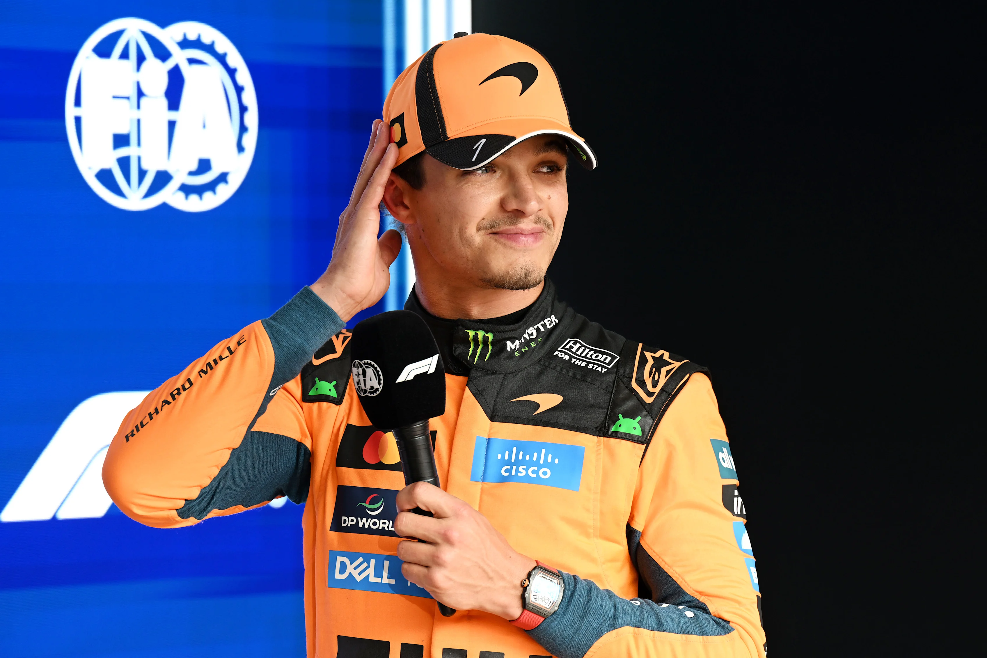 SPA, BELGIUM - JULY 18: Third placed qualifier Lando Norris of Great Britain and McLaren looks on