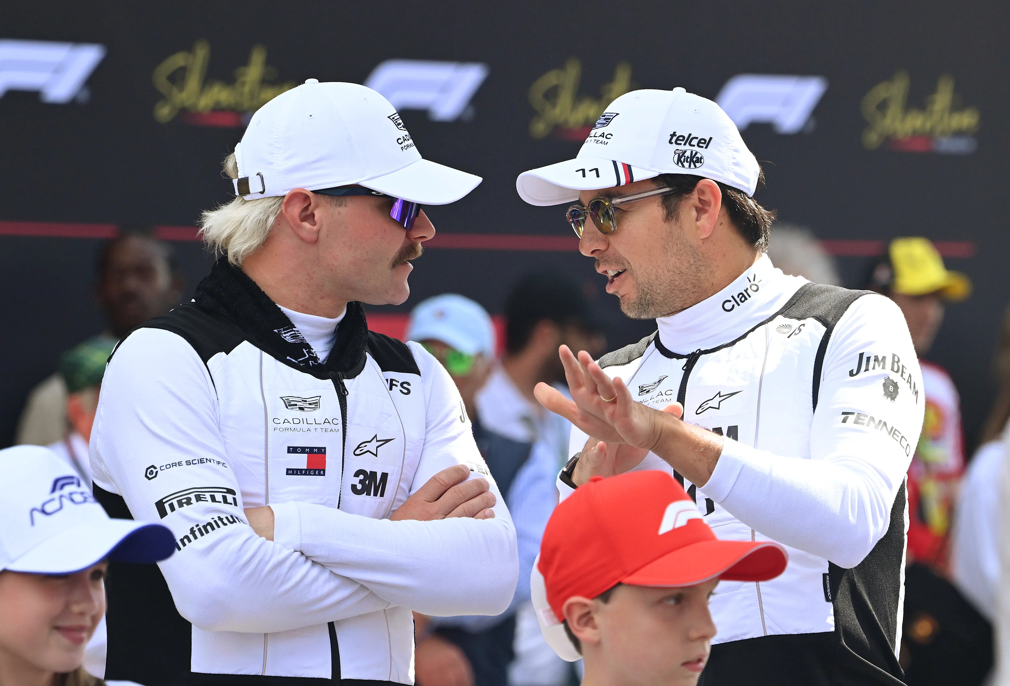 NORTHAMPTON, ENGLAND - JULY 05: Valtteri Bottas of Finland and Cadillac F1 Team and Sergio Perez of