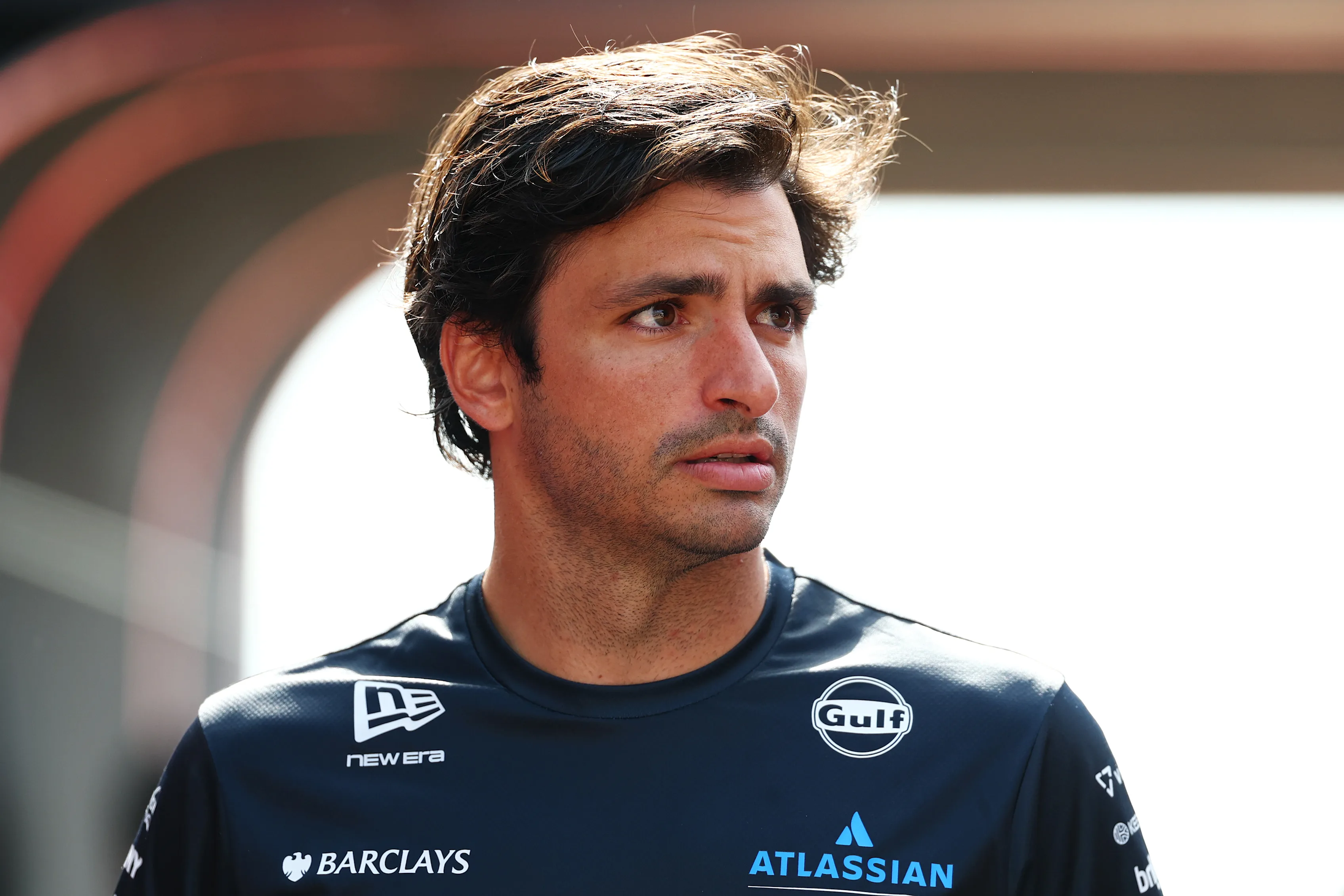NORTHAMPTON, ENGLAND - JULY 03: Carlos Sainz of Spain and Williams arrives in the Paddock prior to
