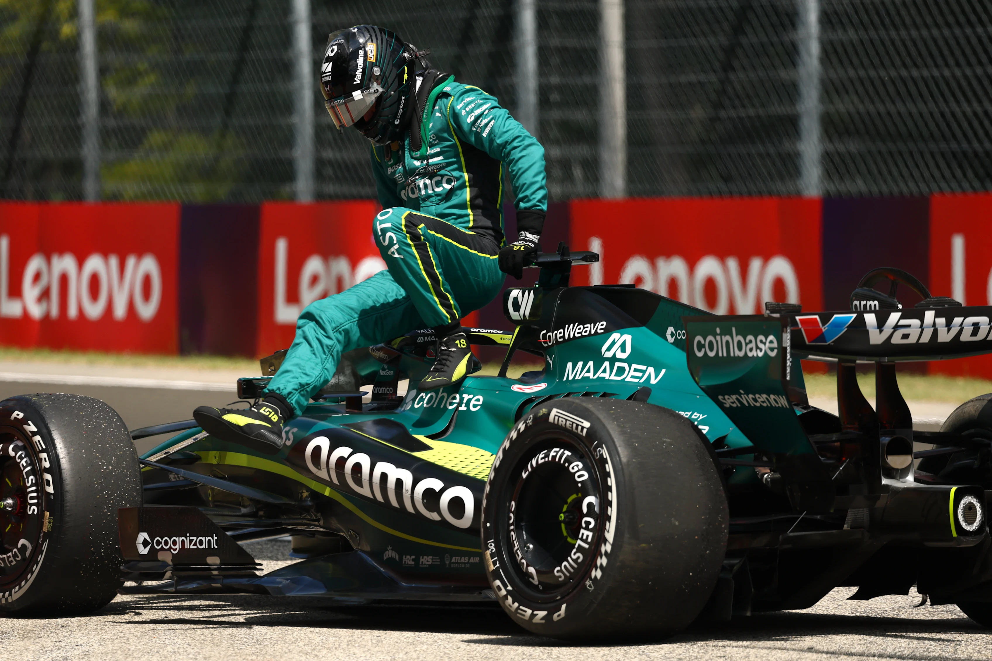 BUDAPEST, HUNGARY - JULY 24: Lance Stroll of Canada and Aston Martin F1 Team climbs out of his car
