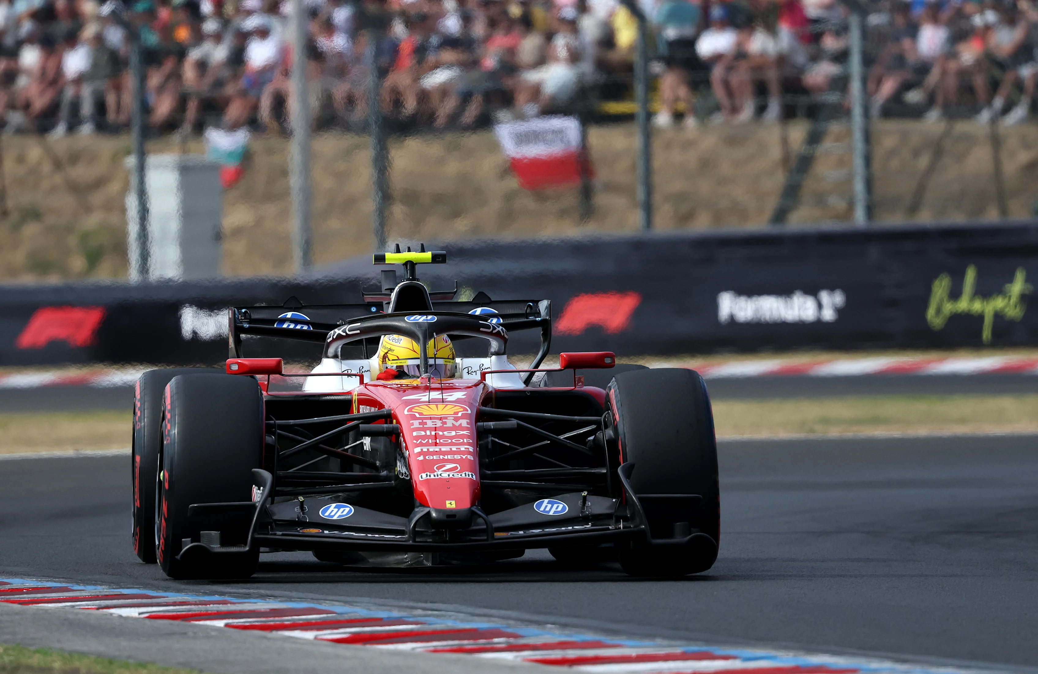 BUDAPEST, HUNGARY - JULY 25: Lewis Hamilton of Great Britain driving the (44) Scuderia Ferrari