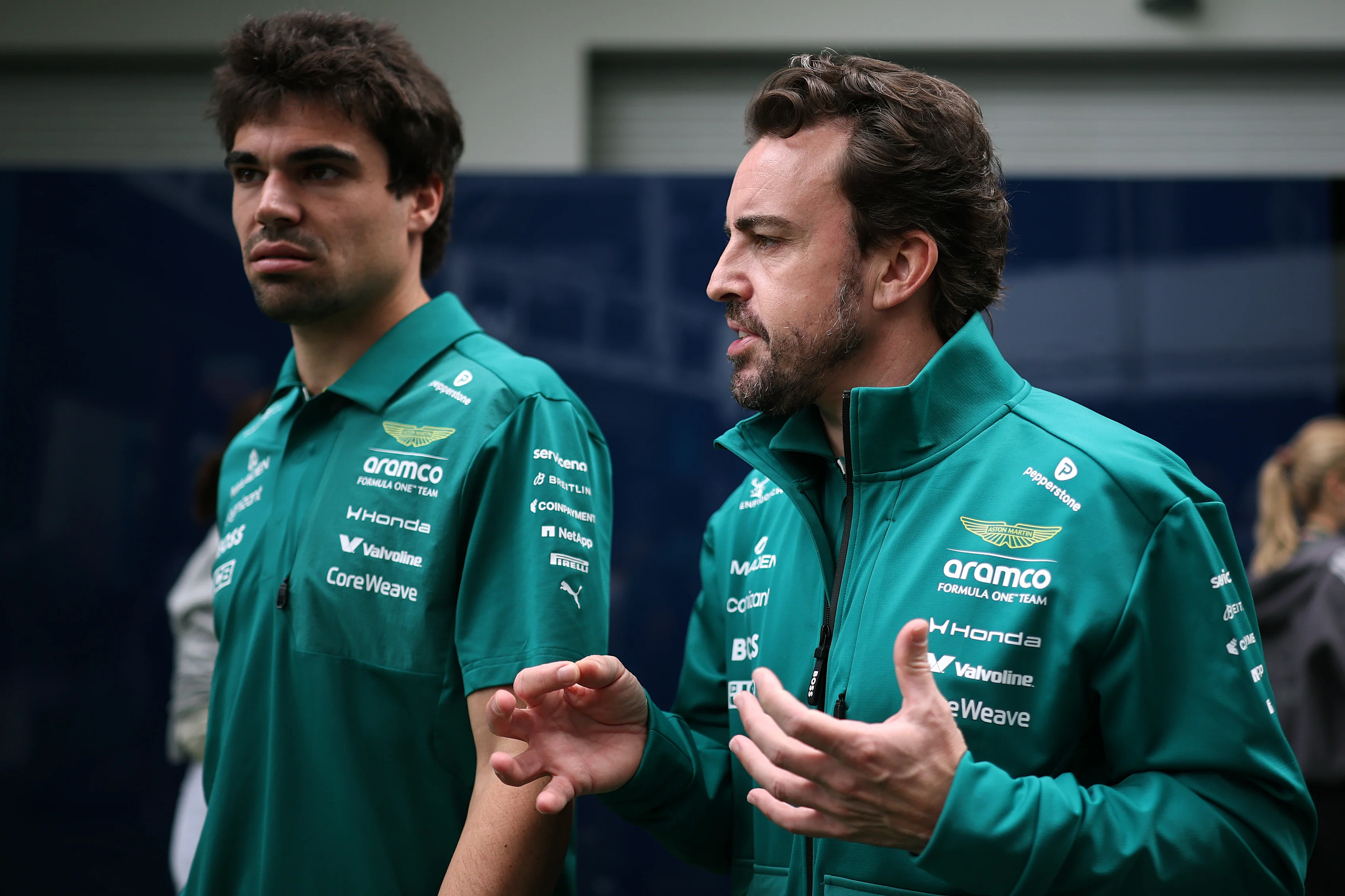MIAMI, FLORIDA - MAY 03: Lance Stroll of Canada and Aston Martin F1 Team and Fernando Alonso of