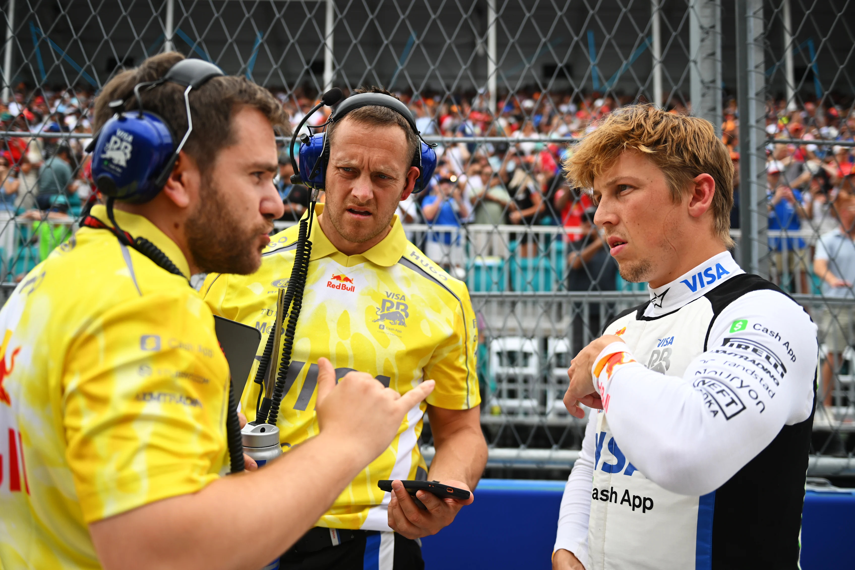 MIAMI, FLORIDA - MAY 03: Liam Lawson of New Zealand and Visa Cash App Racing Bulls talks on the