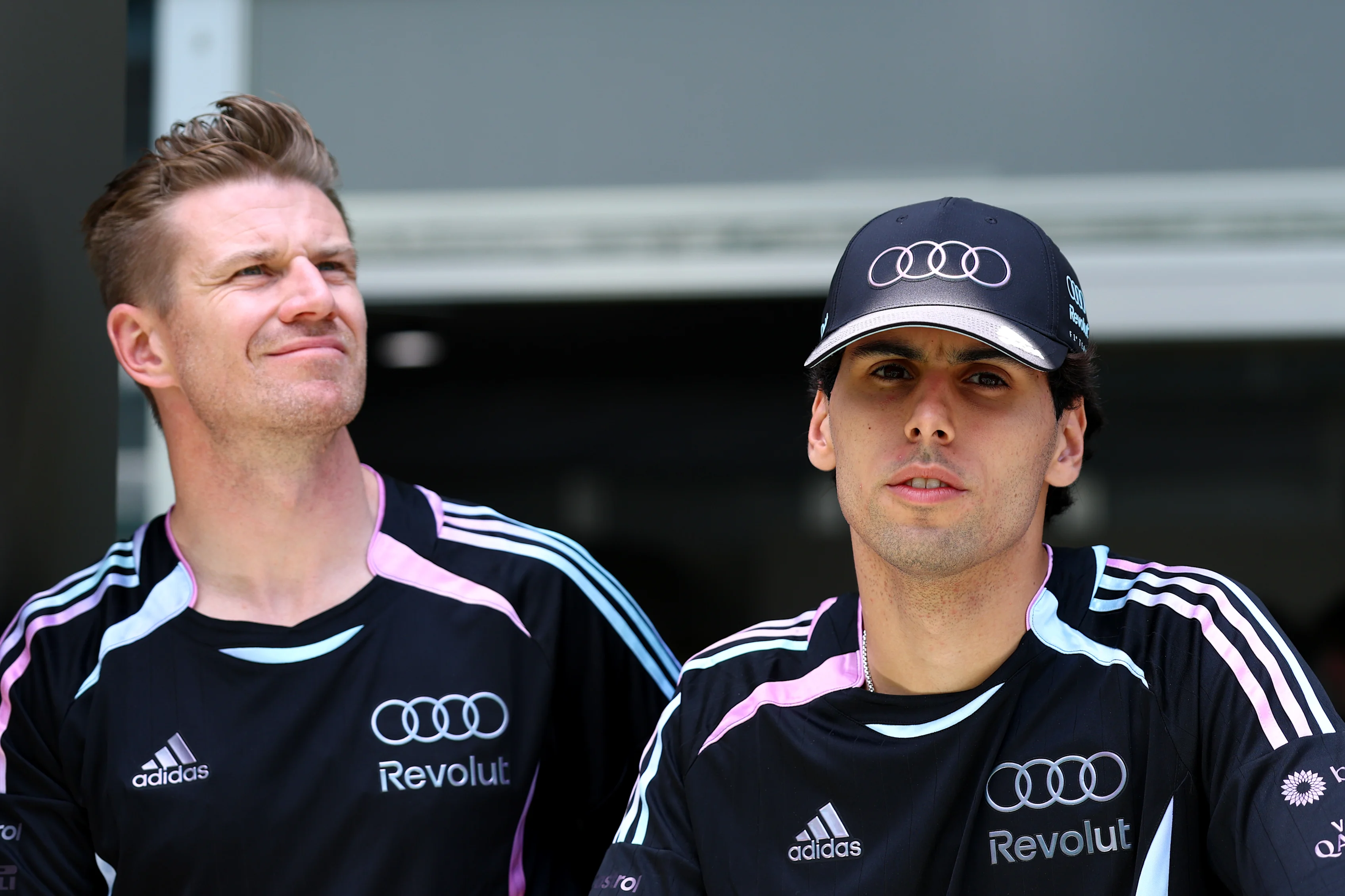 MIAMI, FLORIDA - APRIL 30: Nico Hulkenberg of Germany and Audi F1 Team and Gabriel Bortoleto of
