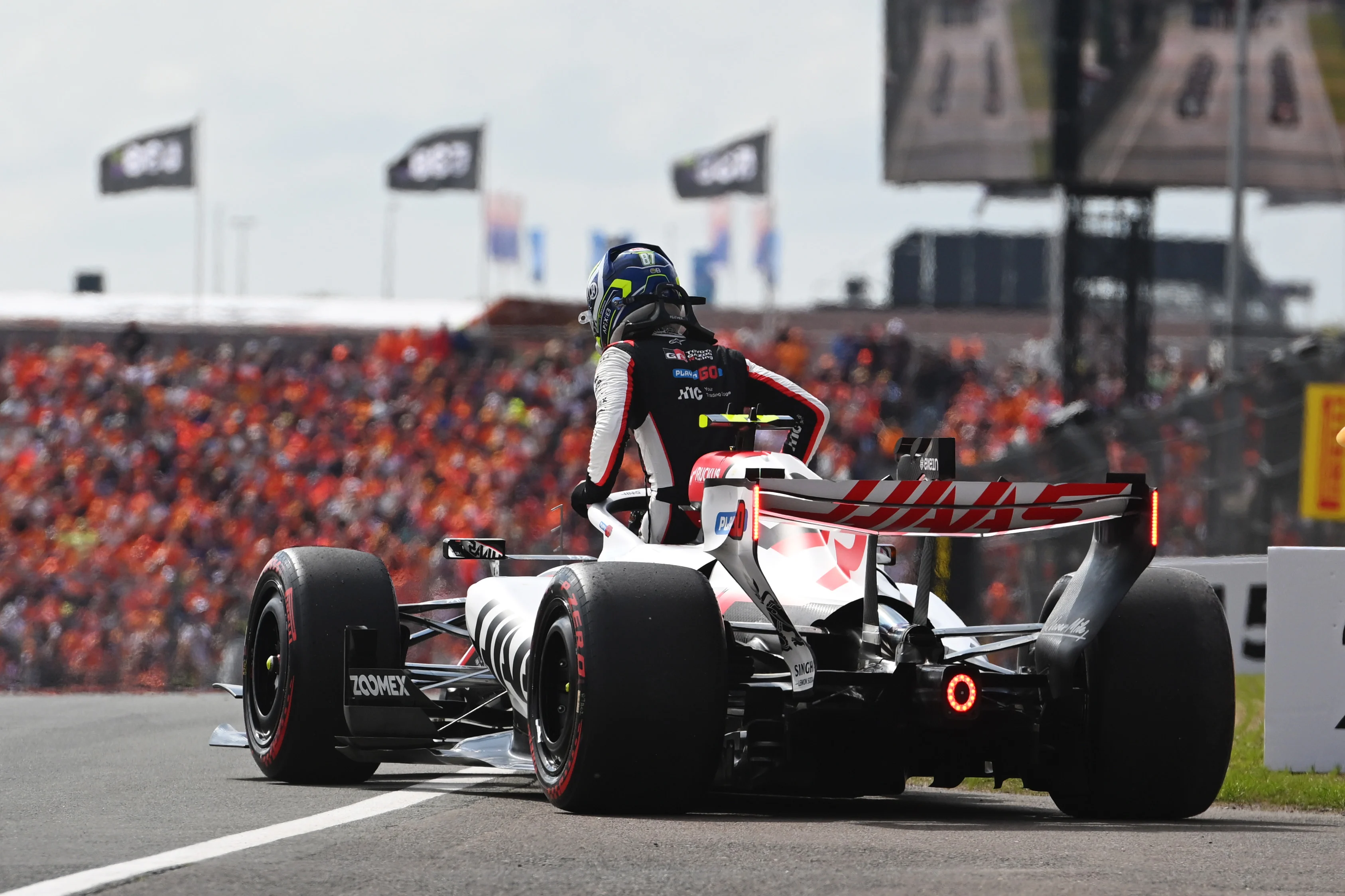 ZANDVOORT, NETHERLANDS - AUGUST 23: Oliver Bearman of Great Britain and Haas F1 climbs out of his