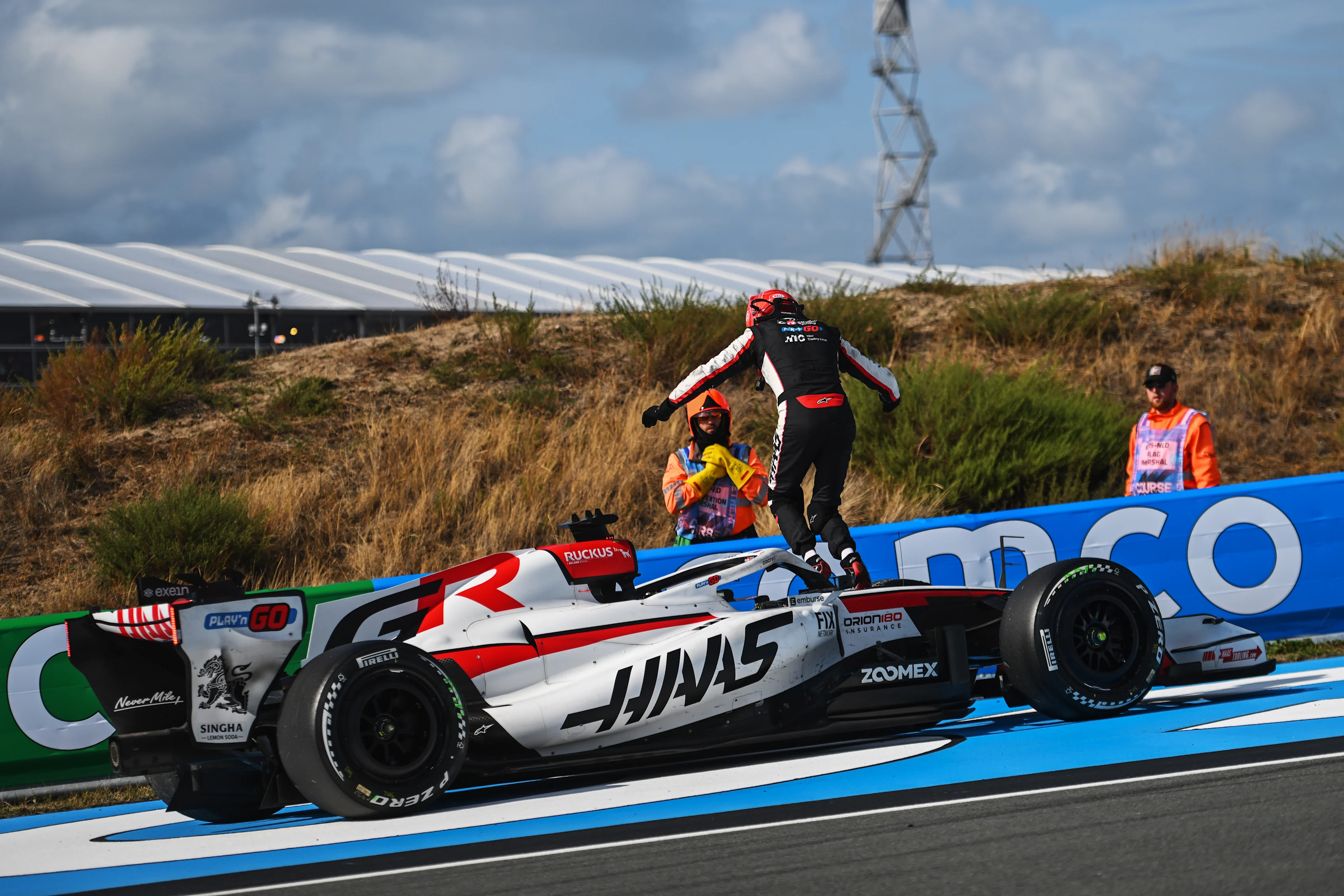ZANDVOORT, NETHERLANDS - AUGUST 23: Esteban Ocon of France and Haas F1 climbs out of his car and