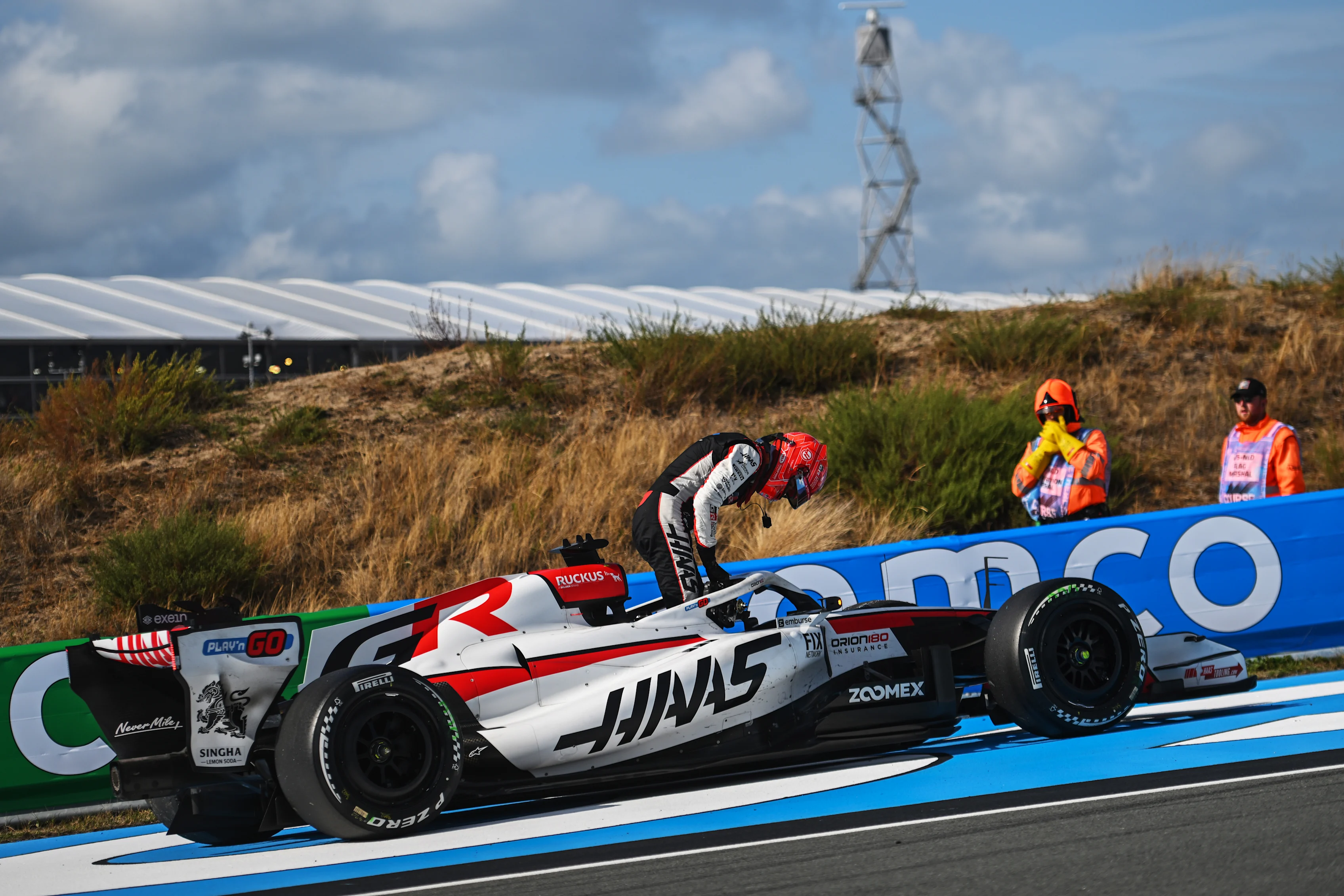 ZANDVOORT, NETHERLANDS - AUGUST 23: Esteban Ocon of France and Haas F1 climbs out of his car and