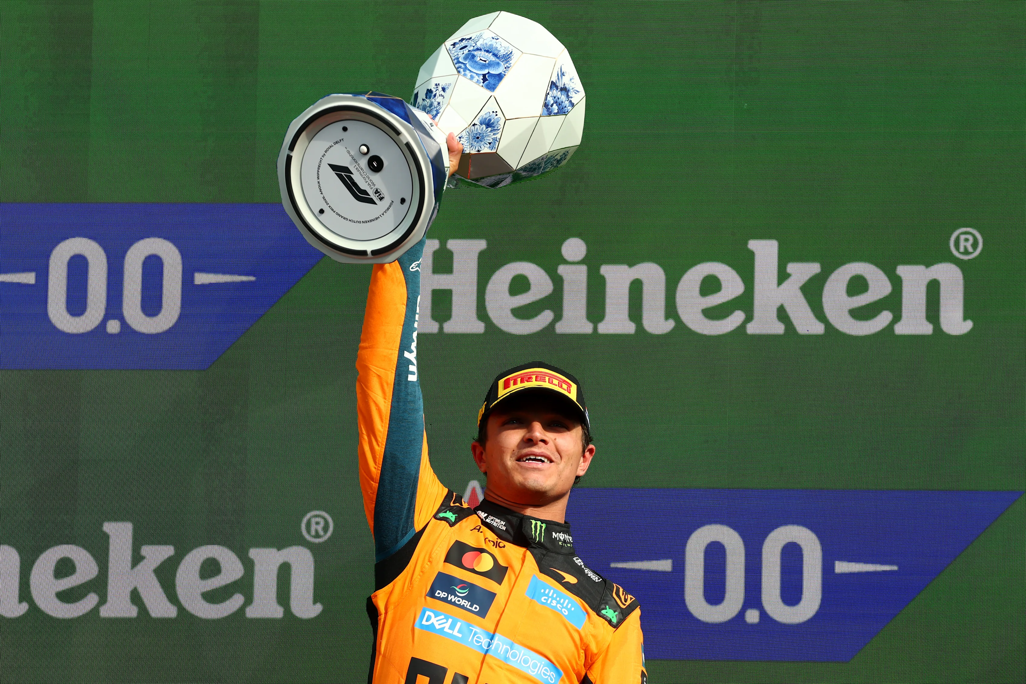 ZANDVOORT, NETHERLANDS - AUGUST 23: Race winner Lando Norris of Great Britain and McLaren lifts his