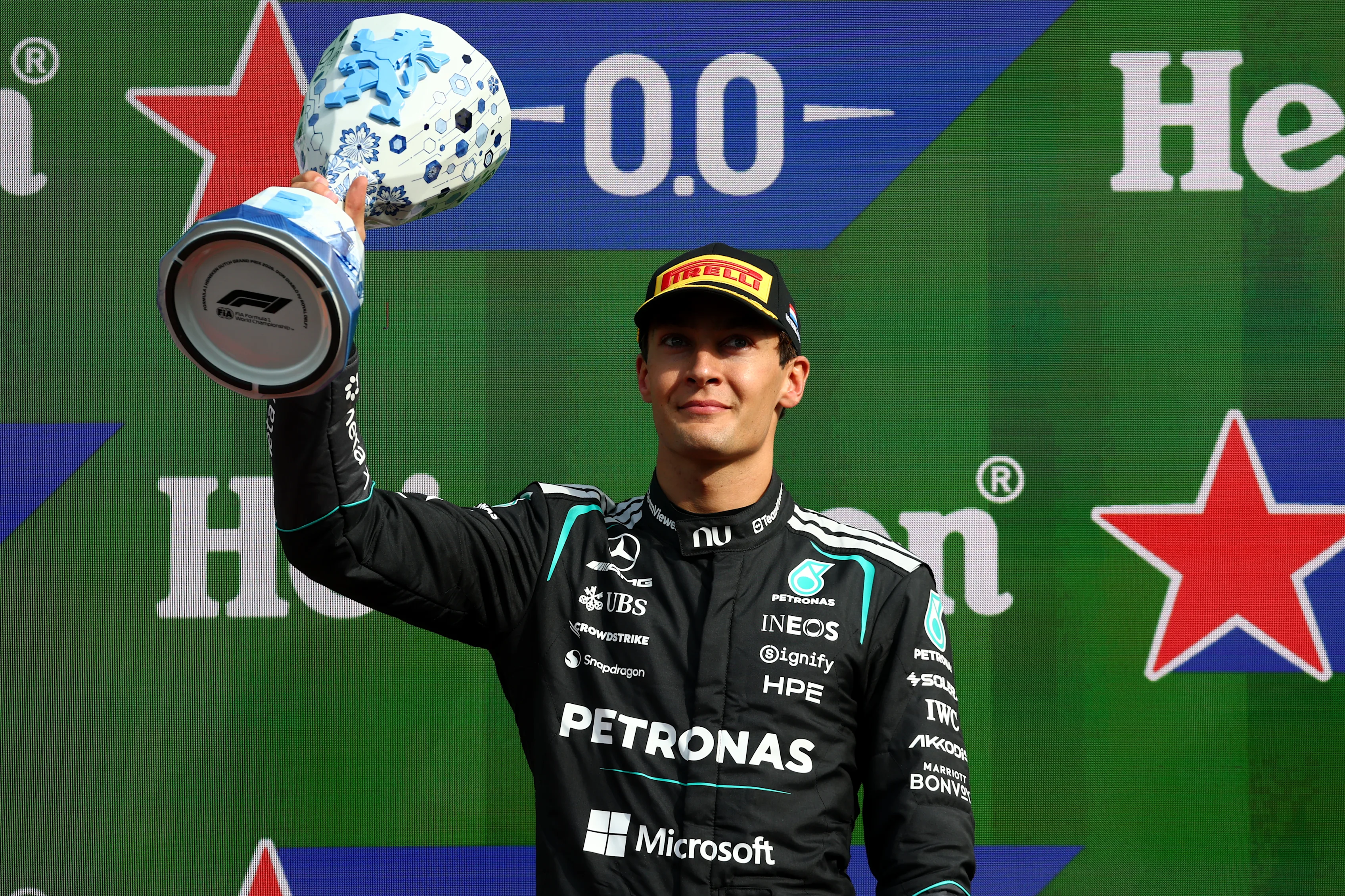 ZANDVOORT, NETHERLANDS - AUGUST 23: Third placed George Russell of Great Britain and Mercedes AMG