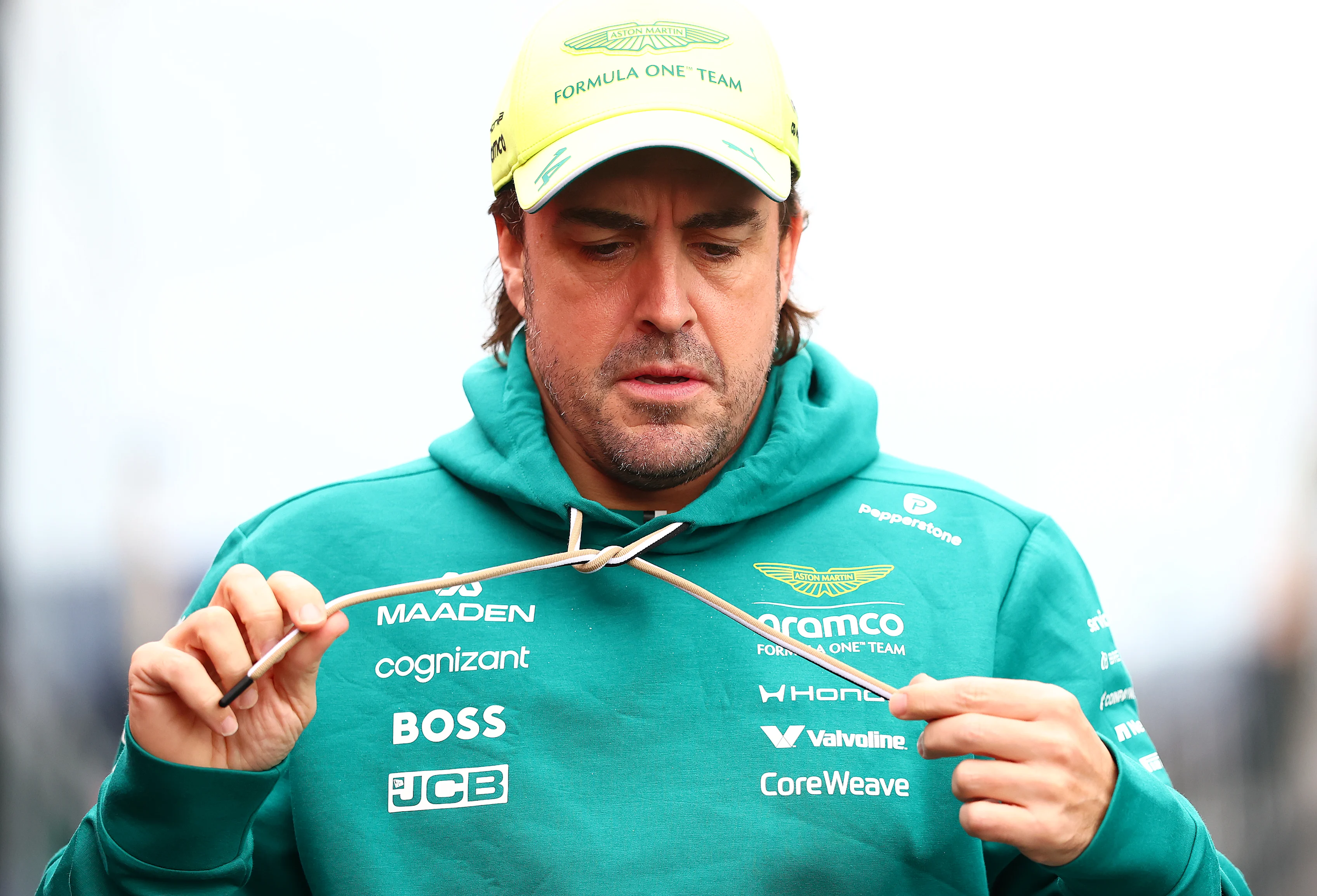 ZANDVOORT, NETHERLANDS - AUGUST 21: Fernando Alonso of Spain and Aston Martin F1 Team walks in the