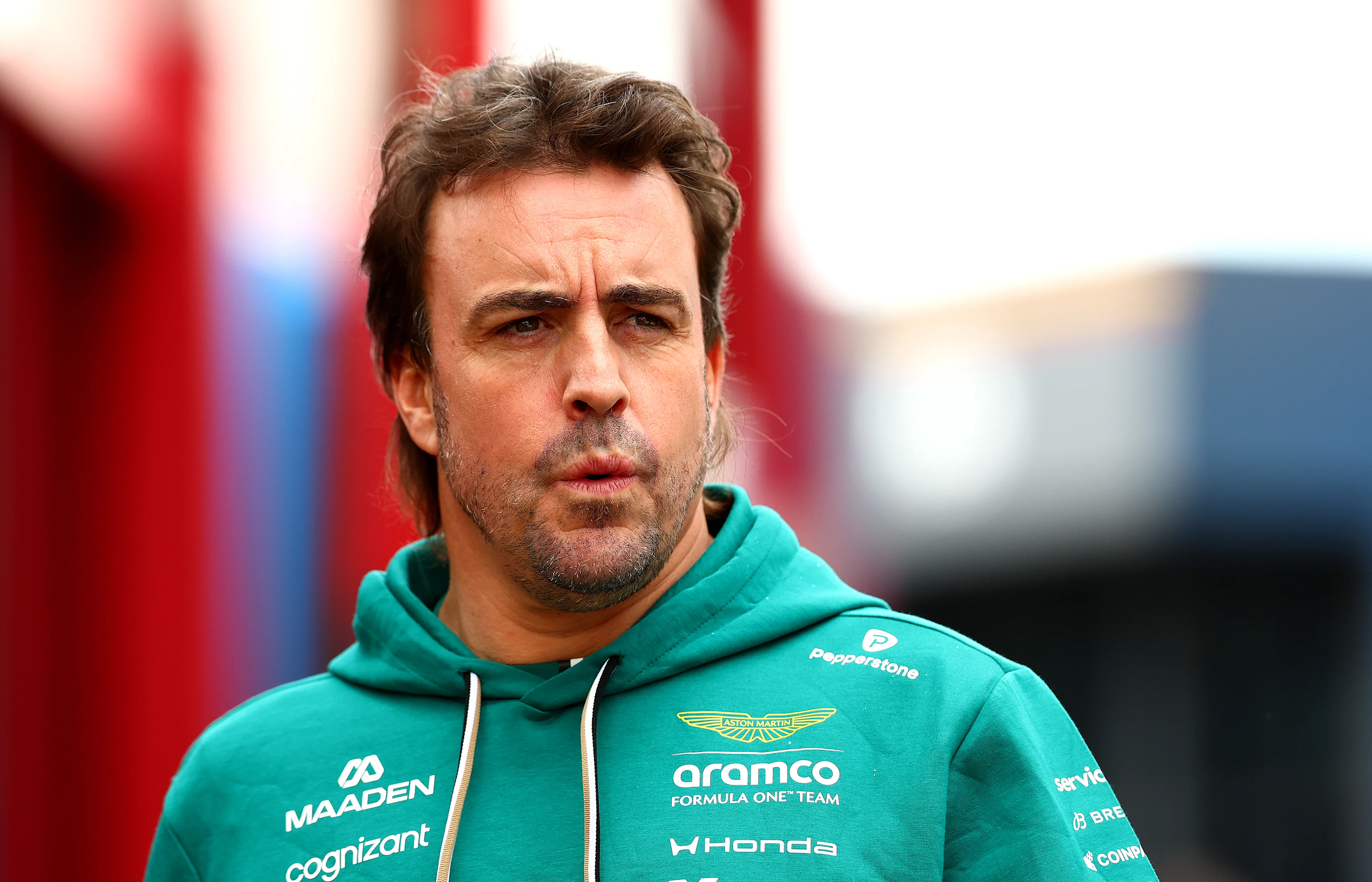 ZANDVOORT, NETHERLANDS - AUGUST 20: Fernando Alonso of Spain and Aston Martin F1 Team looks on in