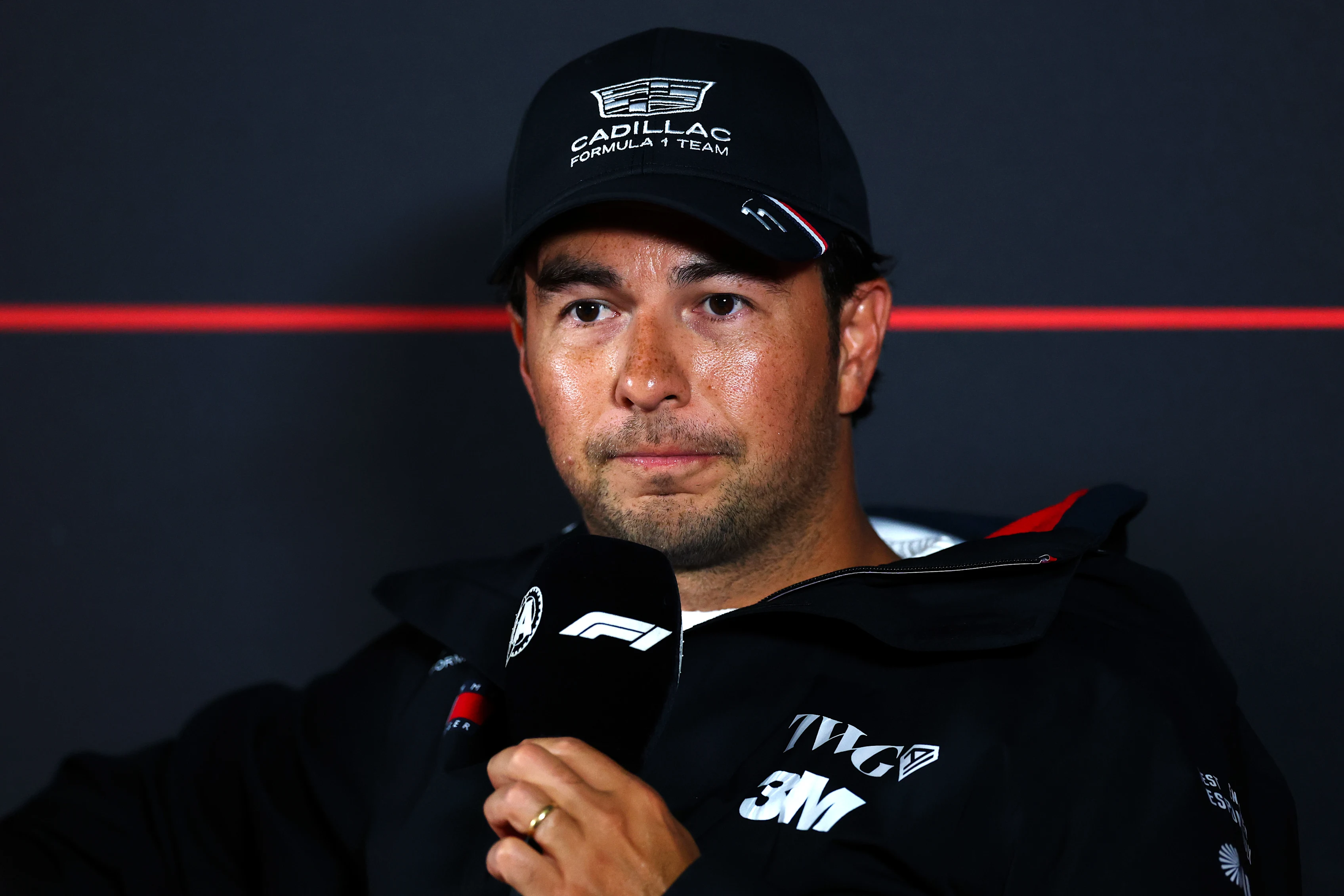 ZANDVOORT, NETHERLANDS - AUGUST 20: Sergio Perez of Mexico and Cadillac F1 Team speaks in the