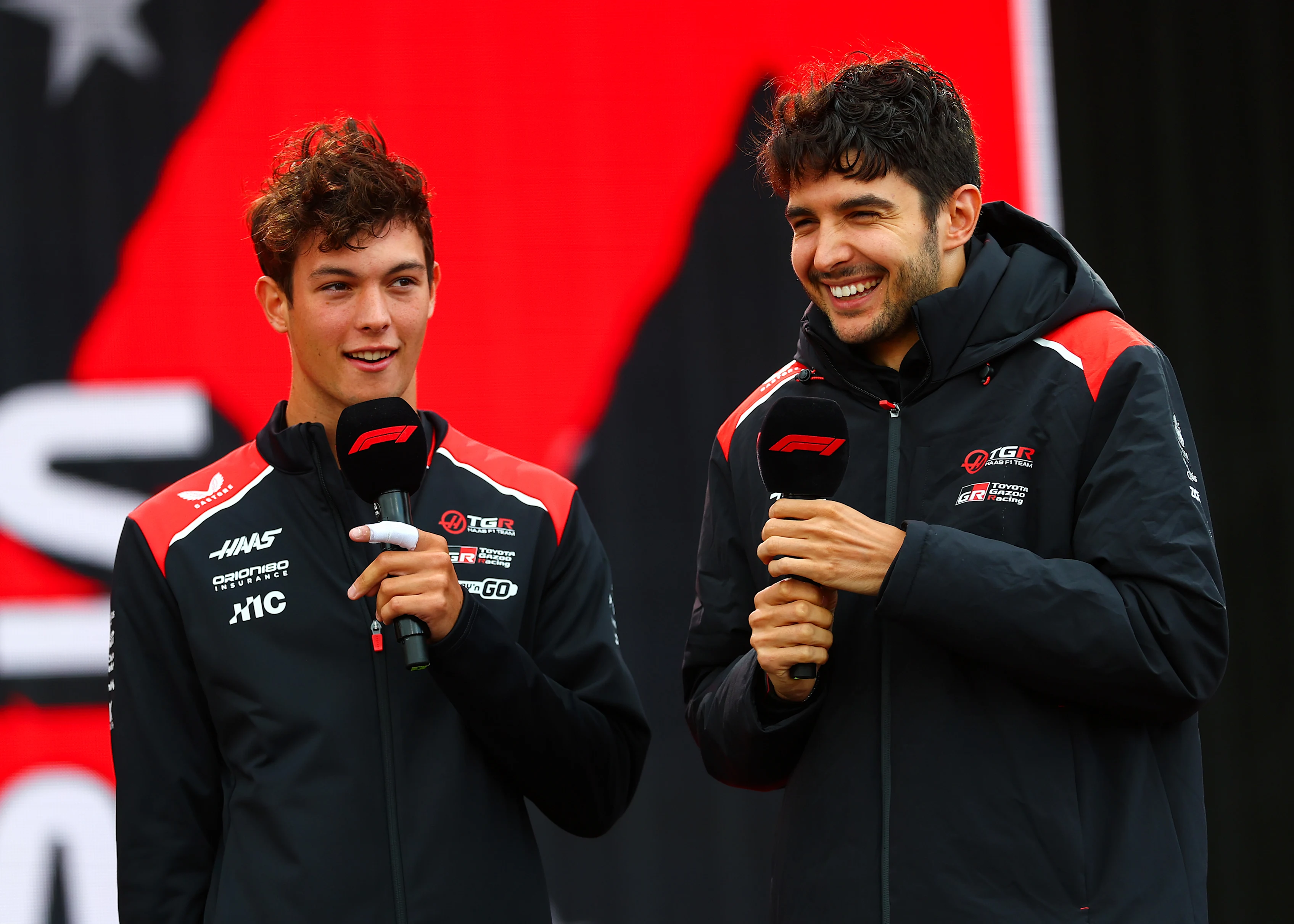 ZANDVOORT, NETHERLANDS - AUGUST 22: Oliver Bearman of Great Britain and Haas F1 and Esteban Ocon of
