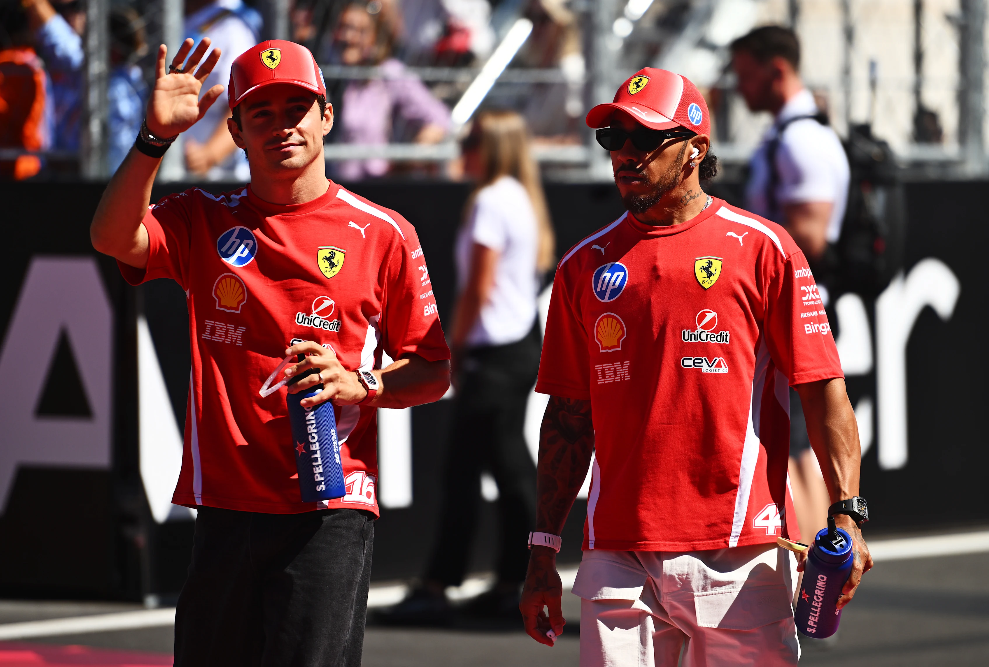 MADRID, SPAIN - SEPTEMBER 13: Charles Leclerc of Monaco and Scuderia Ferrari and Lewis Hamilton of