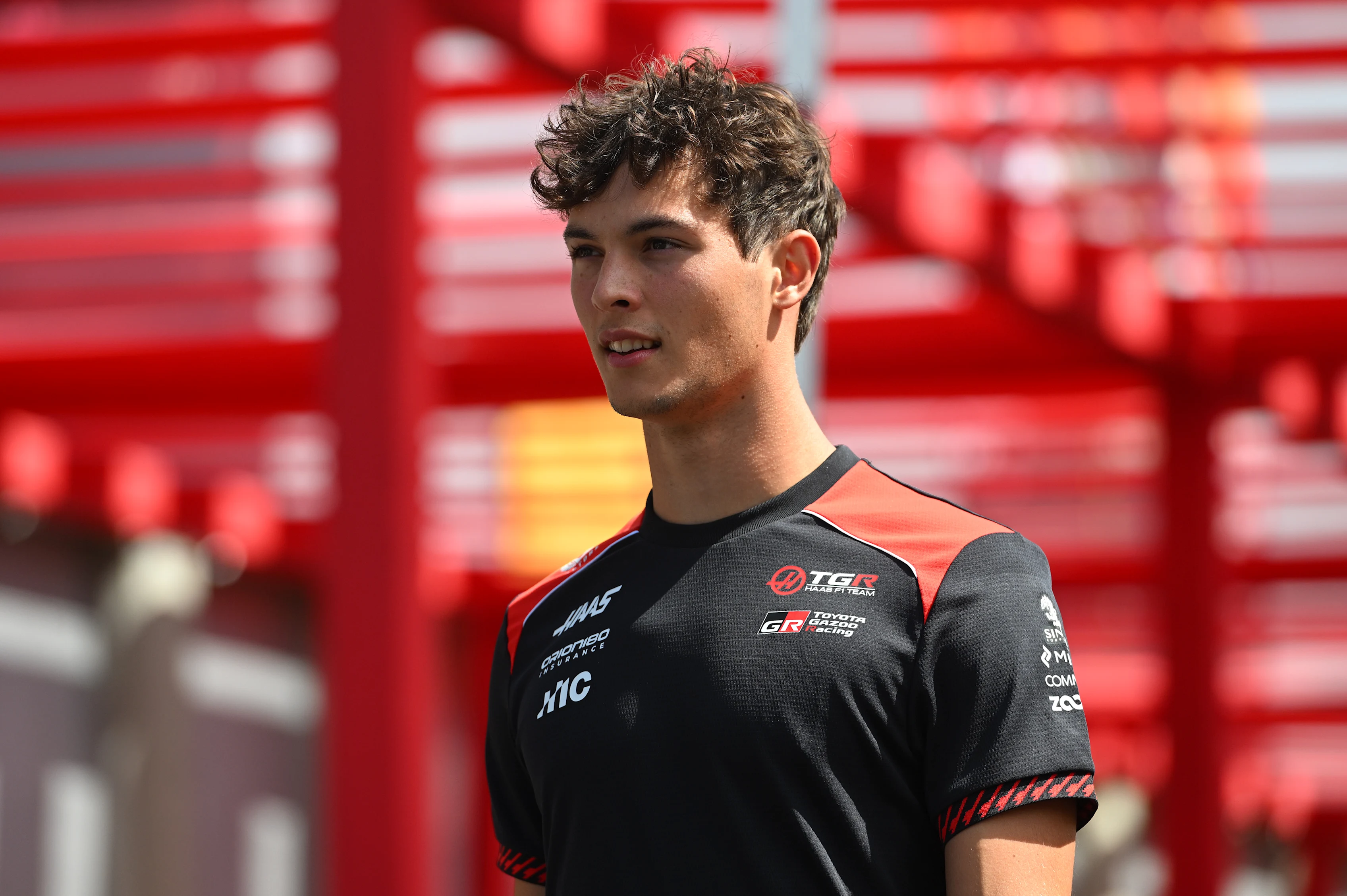 MADRID, SPAIN - SEPTEMBER 10: Oliver Bearman of Great Britain and Haas F1 walks in the Paddock