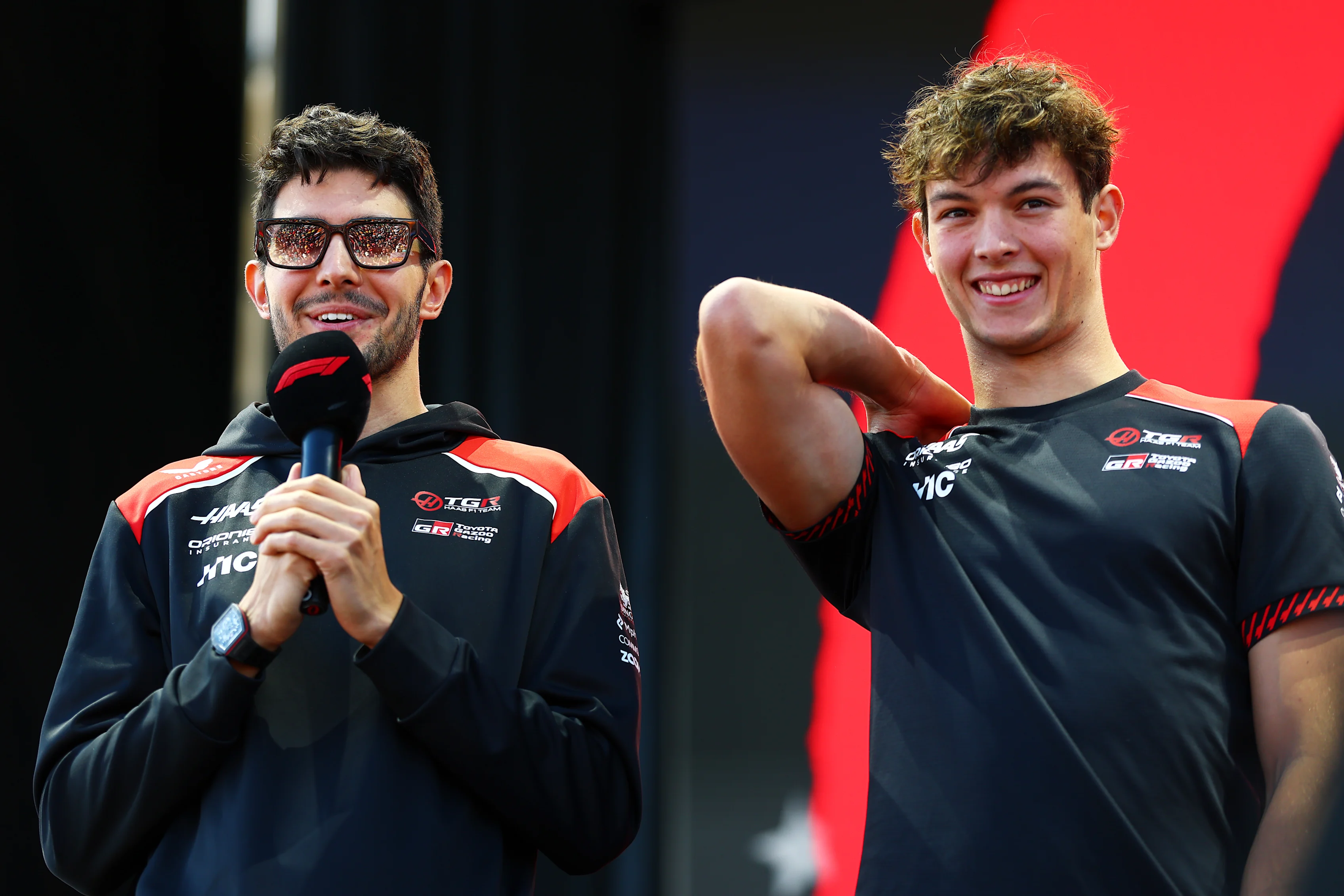 MADRID, SPAIN - SEPTEMBER 12: Esteban Ocon of France and Haas F1 and Oliver Bearman of Great